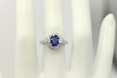 1.85 Carat Blue Sapphire and Trapezoid Diamonds Platinum Statement Sapphire Ring
