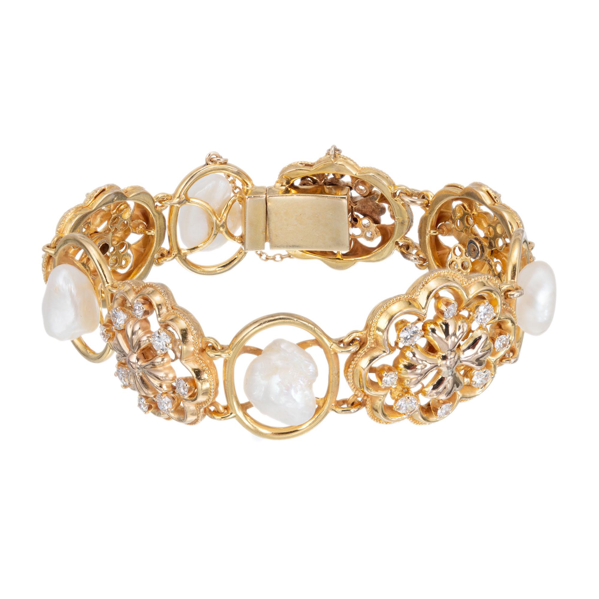 GIA certified natural baroque freshwater pearl and diamond bracelet in 14k yellow gold. Handmade circa 1930's in Victorian revival style with a safety chain. 

4 natural white with Orient overtones baroque pearls unionidae freshwater 11.47 x 9.48mm