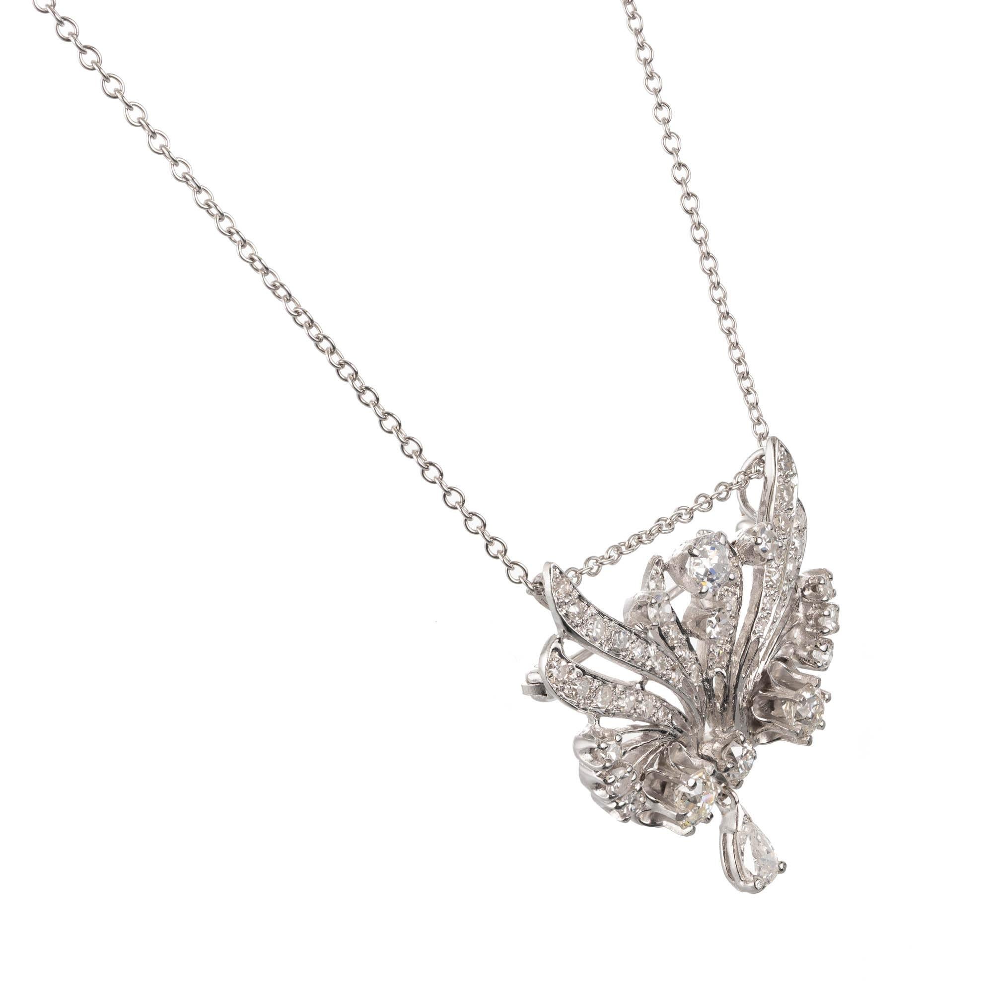Vintage 1960's 1.85 carat diamond pendant necklace brooch in 14k white gold. 

1 pear shape K-L I diamond, Approximate .25 carats 
4 old European cut I-j VS-SI diamonds, Approximate 1.05 carats
35 single cut I-J SI diamonds, Approximate .55 carats