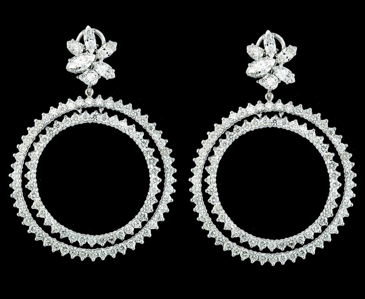 18.5 Carat Large  Two Circle Diamond  Hoop Gala Cocktail Earrings 18 Karat White Gold
A fabulous pair of earrings with an enormous amount of look and sparkle!
Large marquis shape diamonds make a large Stud which sits on the ear lobe from which hangs