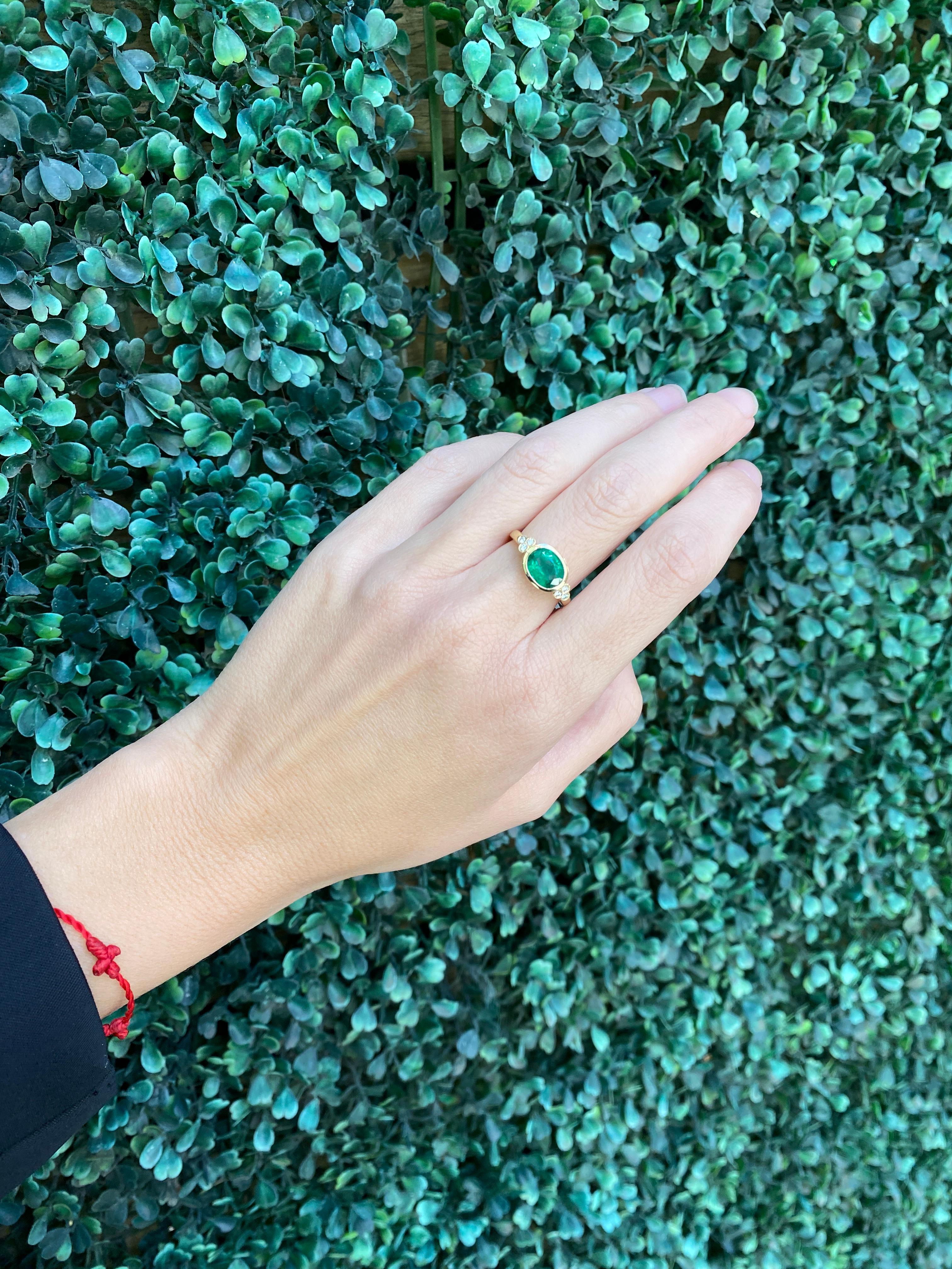 1.85 Carat Natural Oval Cut Bezel Set Emerald 14 Karat Yellow Gold Ring For Sale 6