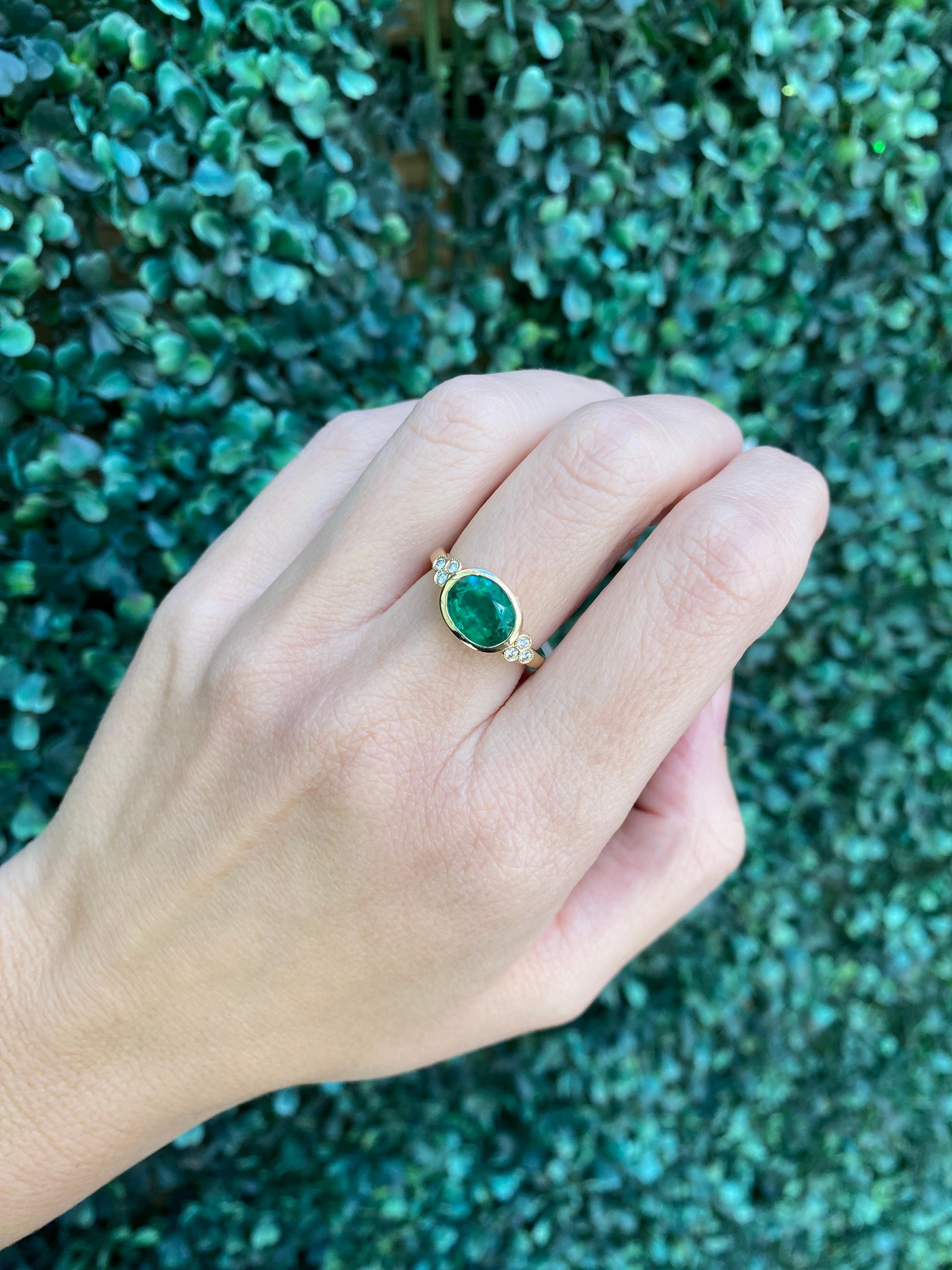 1.85 Carat Natural Oval Cut Bezel Set Emerald 14 Karat Yellow Gold Ring For Sale 7
