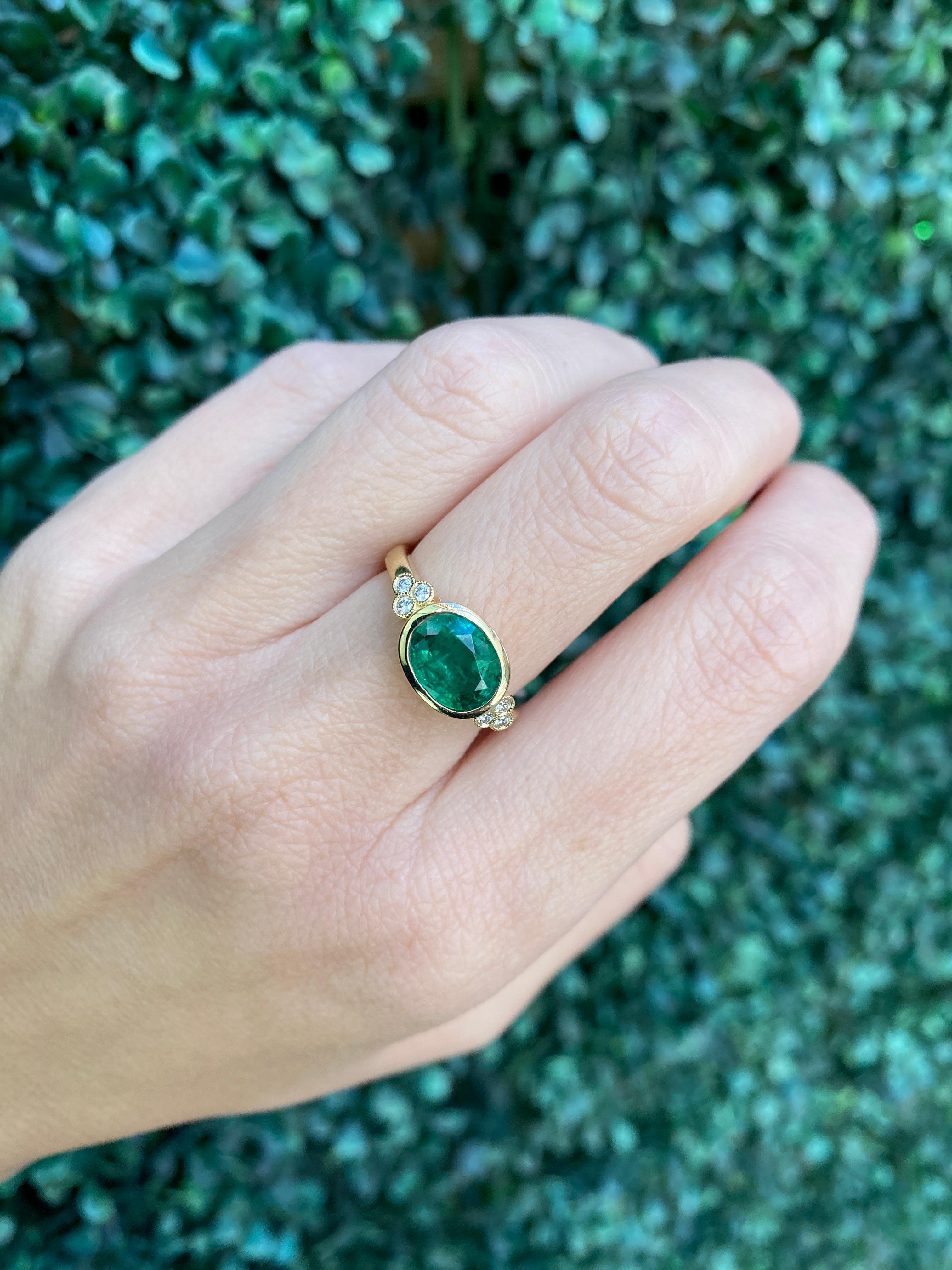 1.85 Carat Natural Oval Cut Bezel Set Emerald 14 Karat Yellow Gold Ring For Sale 8