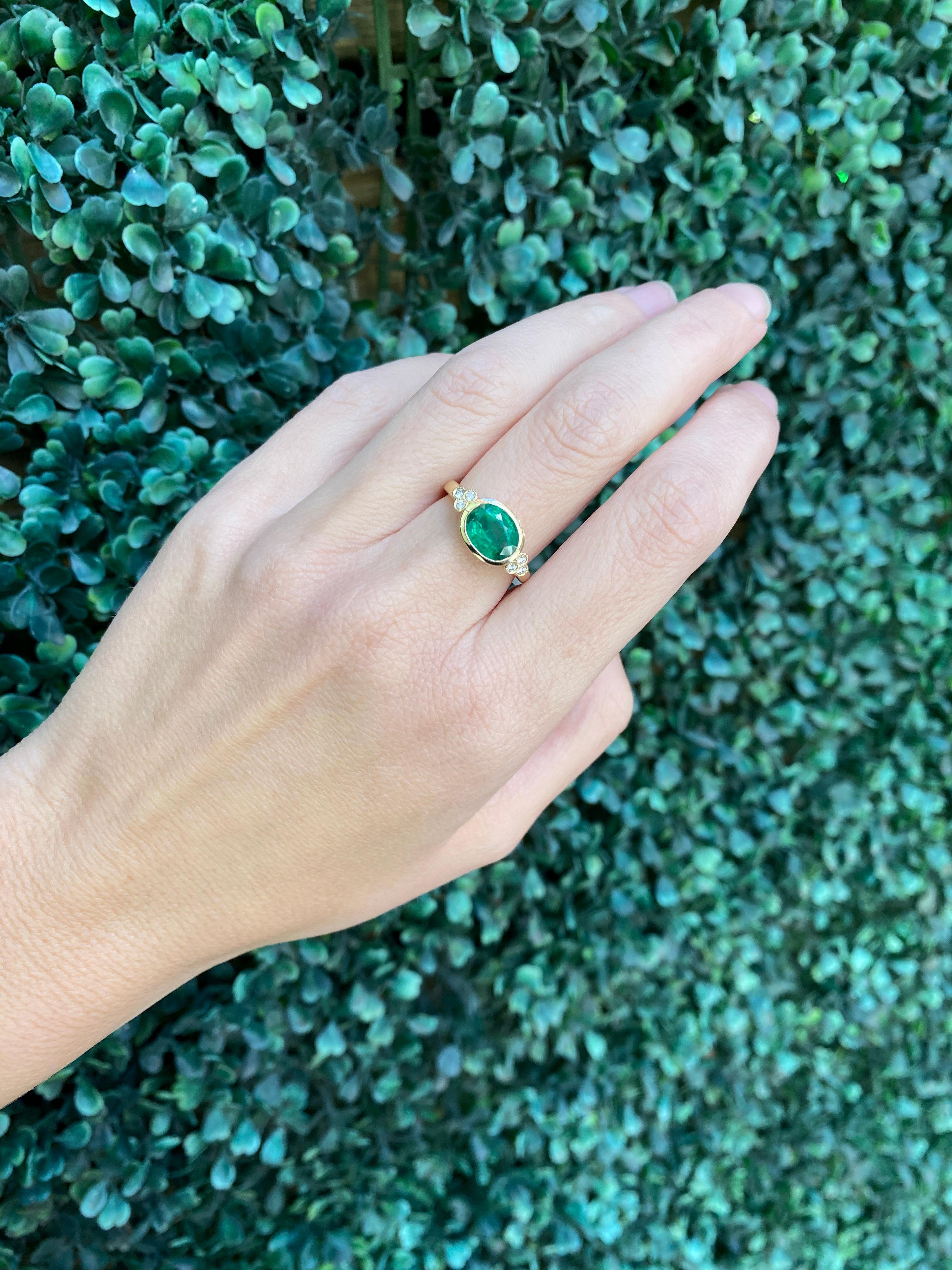 1.85 Carat Natural Oval Cut Bezel Set Emerald 14 Karat Yellow Gold Ring For Sale 9
