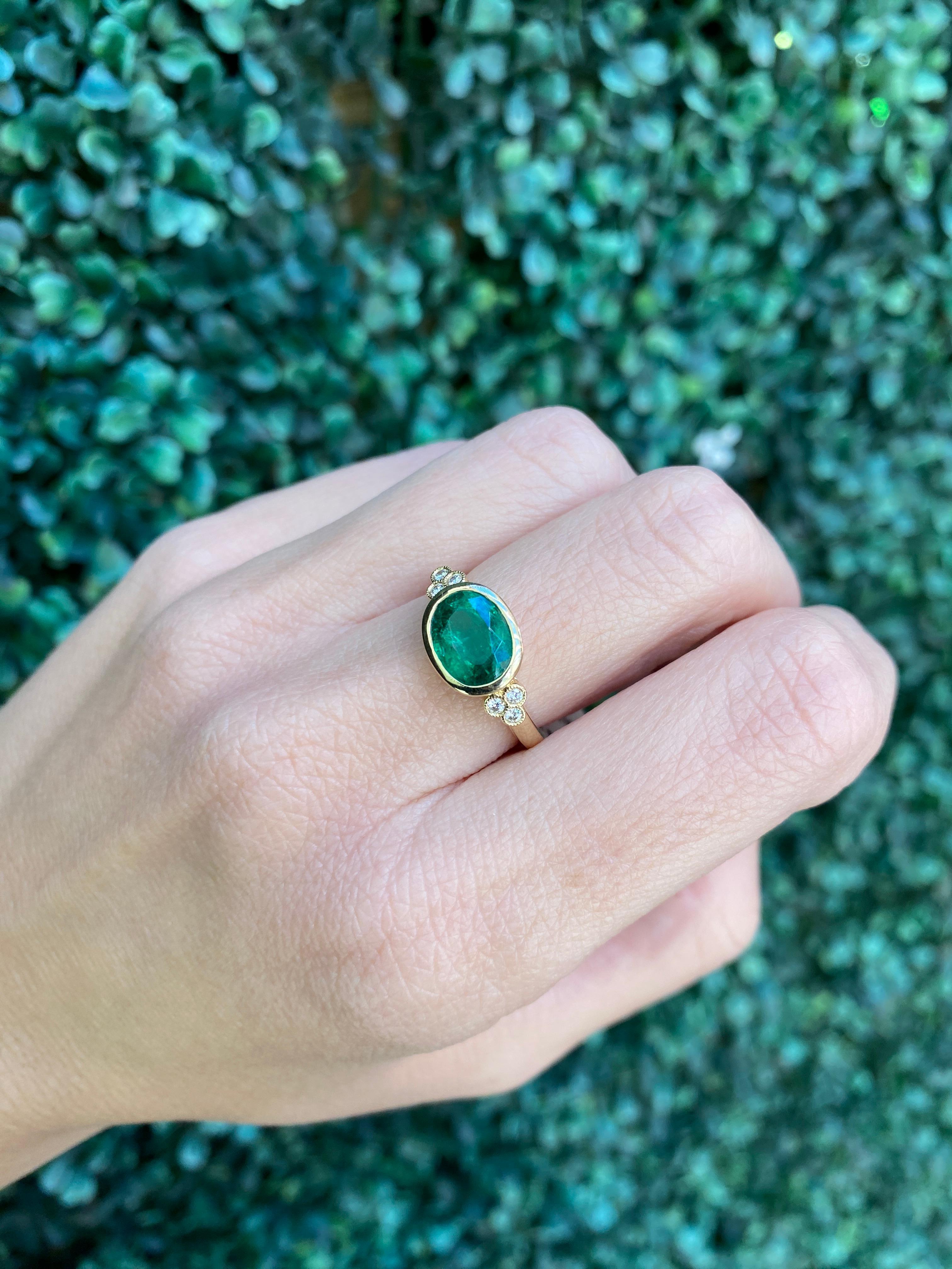 1.85 Carat Natural Oval Cut Bezel Set Emerald 14 Karat Yellow Gold Ring For Sale 10