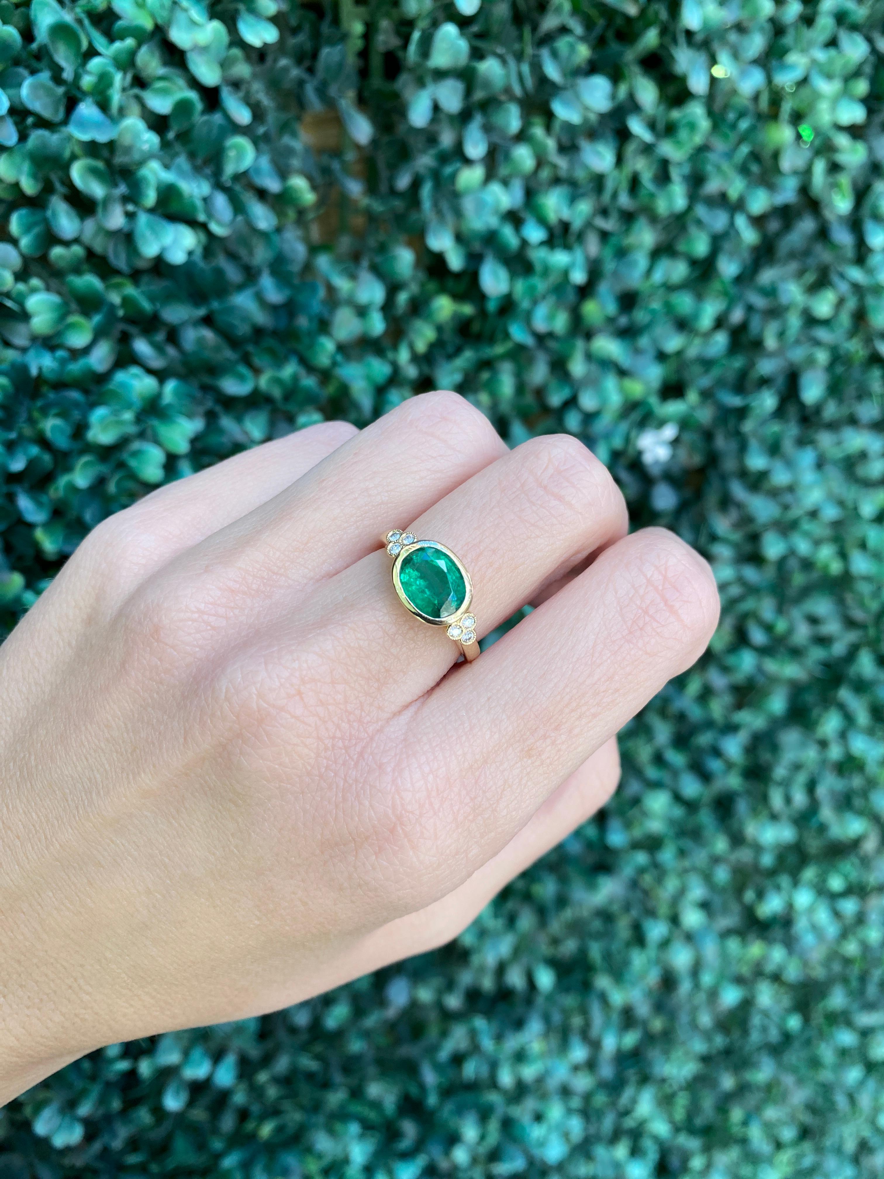 1.85 Carat Natural Oval Cut Bezel Set Emerald 14 Karat Yellow Gold Ring For Sale 11