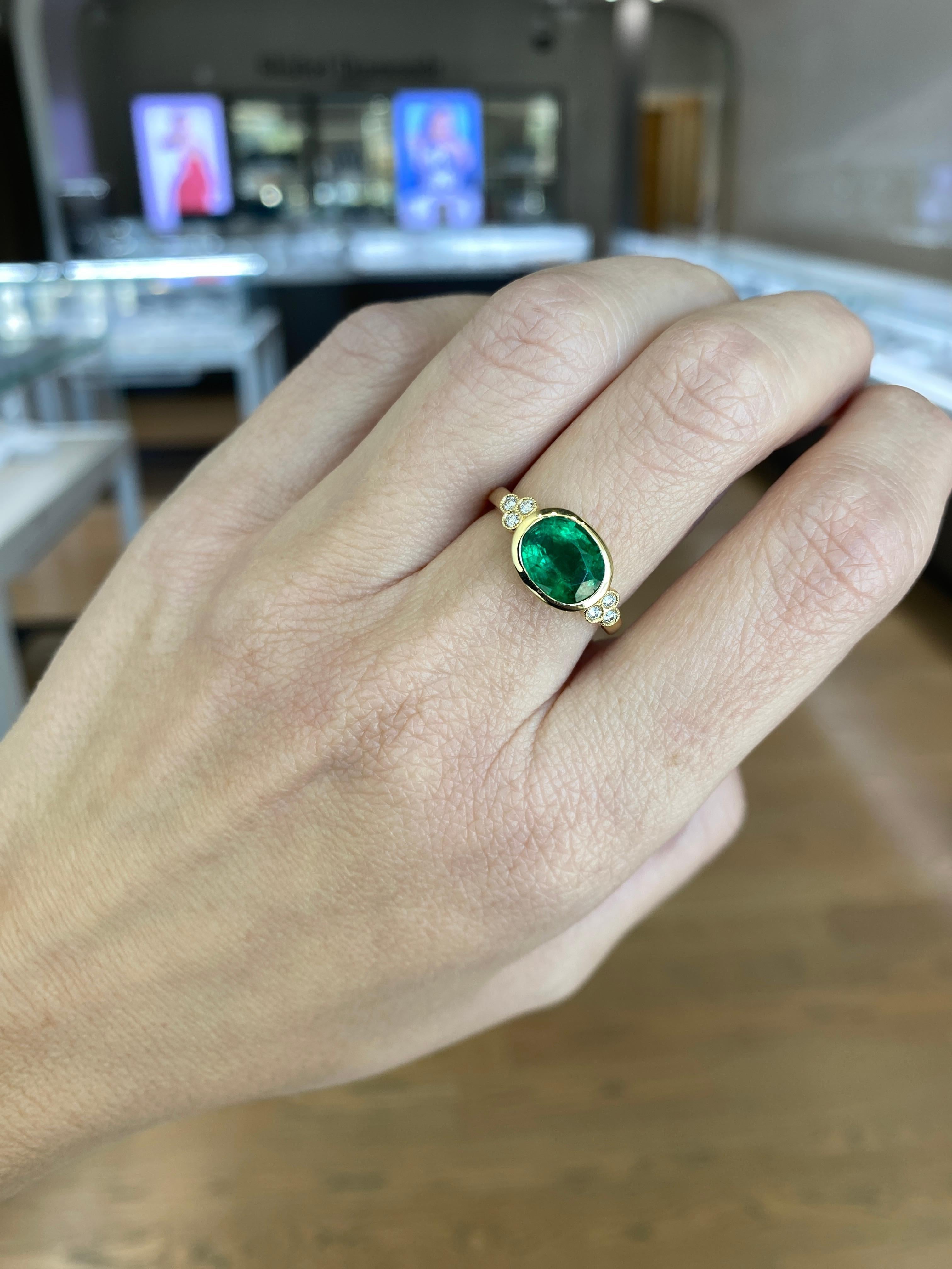 1.85 Carat Natural Oval Cut Bezel Set Emerald 14 Karat Yellow Gold Ring For Sale 15