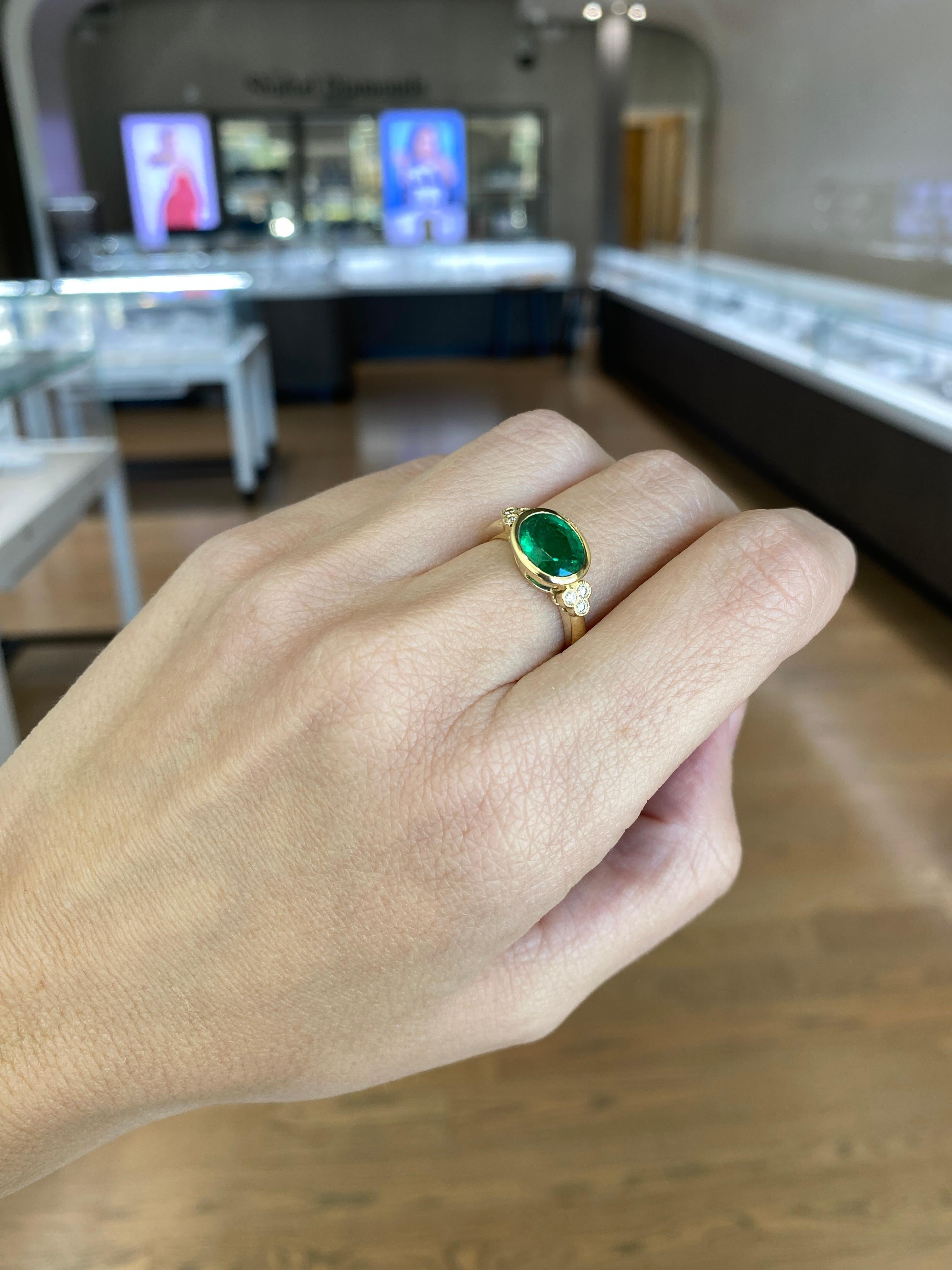 1.85 Carat Natural Oval Cut Bezel Set Emerald 14 Karat Yellow Gold Ring For Sale 16