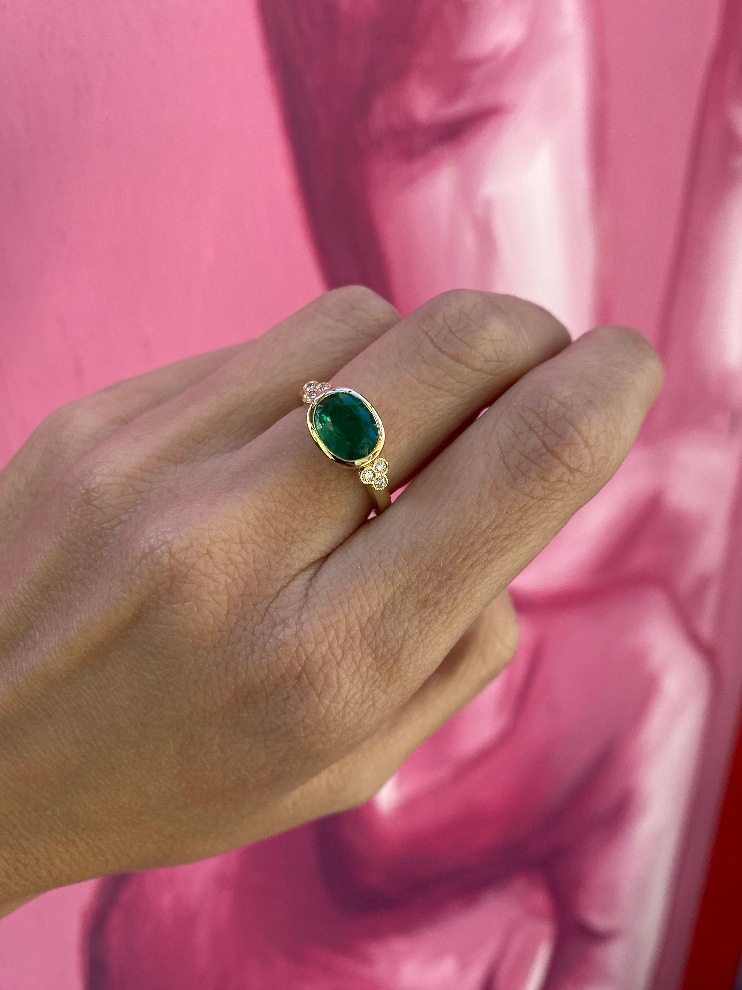 1.85 Carat Natural Oval Cut Bezel Set Emerald 14 Karat Yellow Gold Ring For Sale 1
