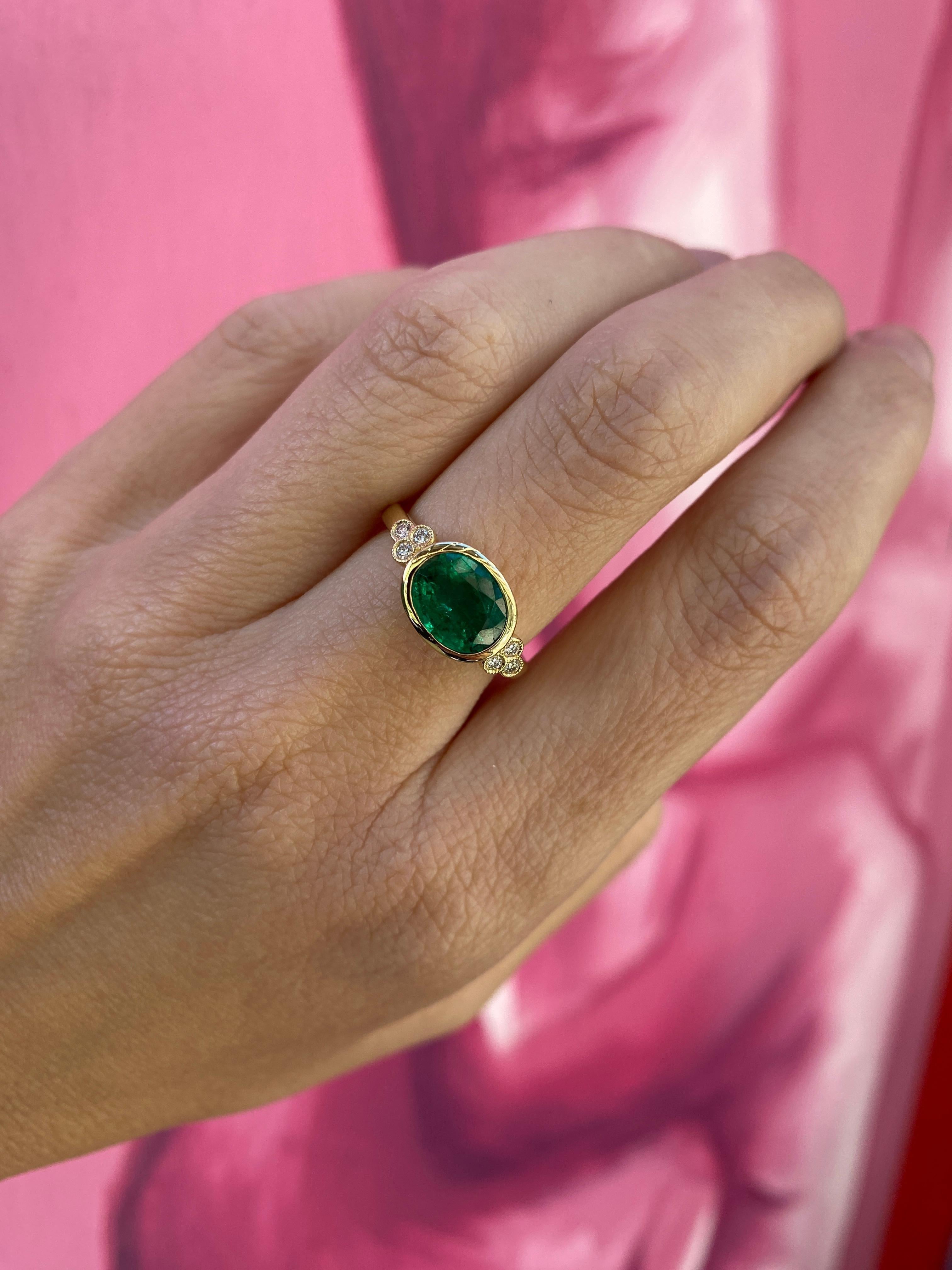 1.85 Carat Natural Oval Cut Bezel Set Emerald 14 Karat Yellow Gold Ring For Sale 2