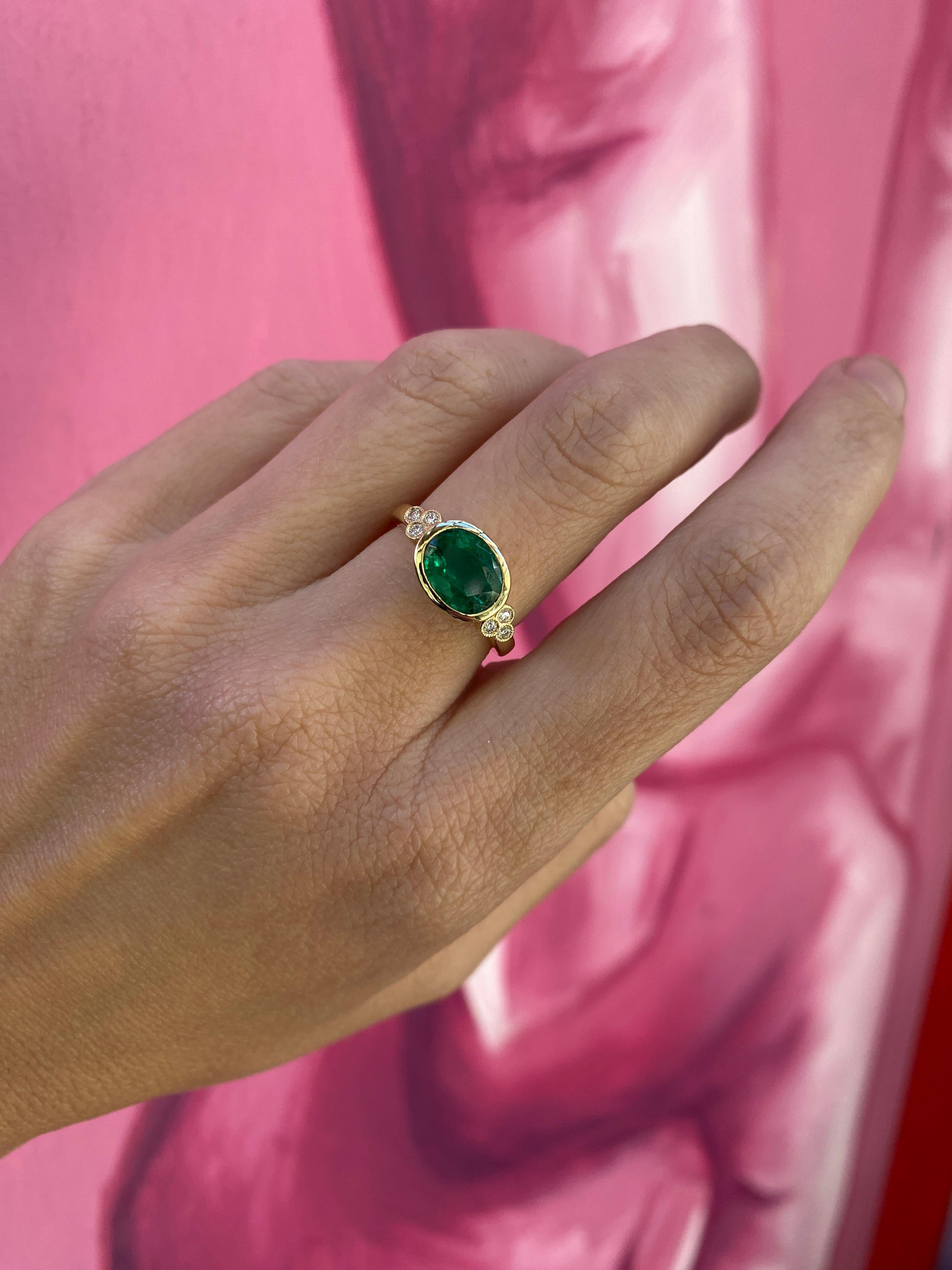 1.85 Carat Natural Oval Cut Bezel Set Emerald 14 Karat Yellow Gold Ring For Sale 3