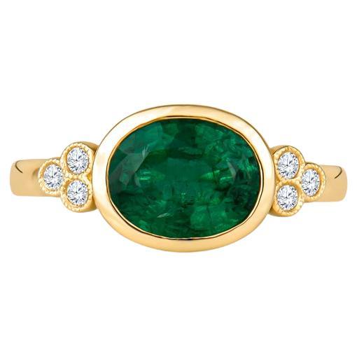 1.85 Carat Natural Oval Cut Bezel Set Emerald 14 Karat Yellow Gold Ring For Sale