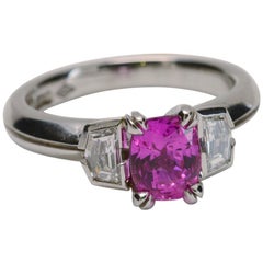 1.85 Carat Natural Pink Sapphire with 0.45 Carat Diamonds Three-Stone Ring