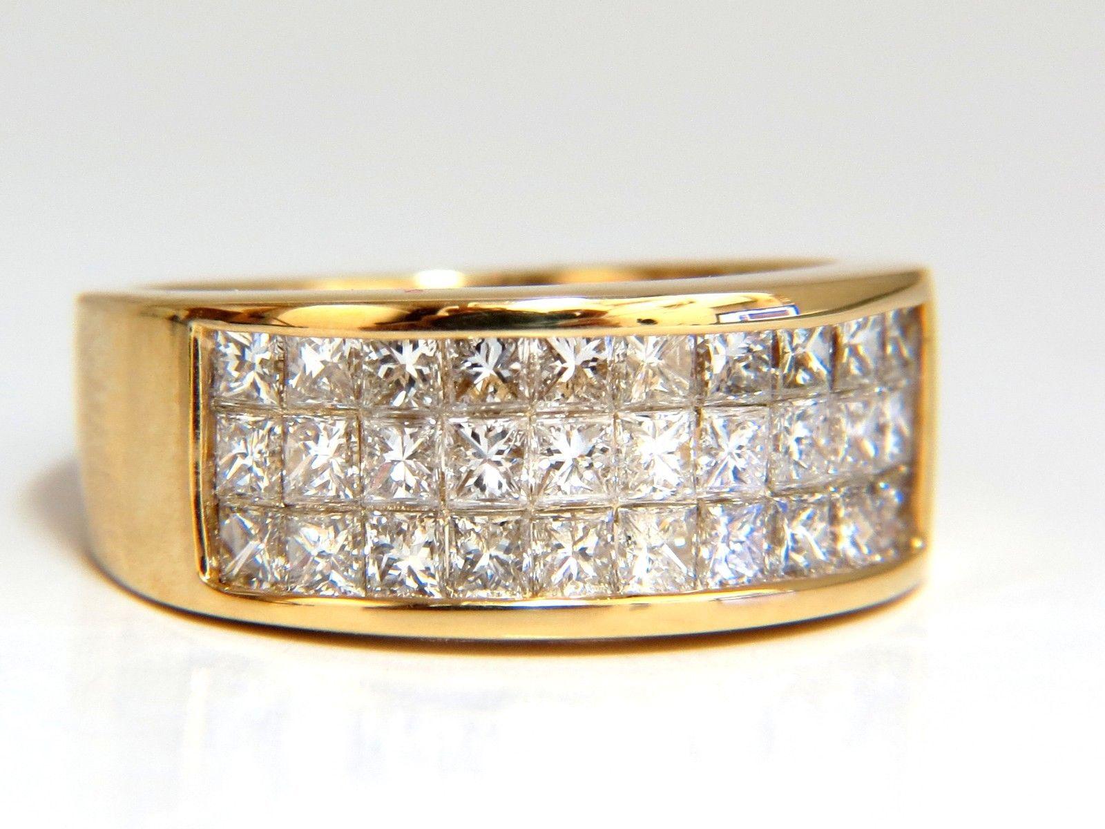 Princess Durable
1.85ct. Natural Princess cut brilliant diamond

Channel Row ring.

Vs-2 clarity  H color.

14kt yellow gold.

6.8 Grams

Overall ring: 8mm diameter

Depth: 3mm

Current ring size: 6.25

May professionally resize, please