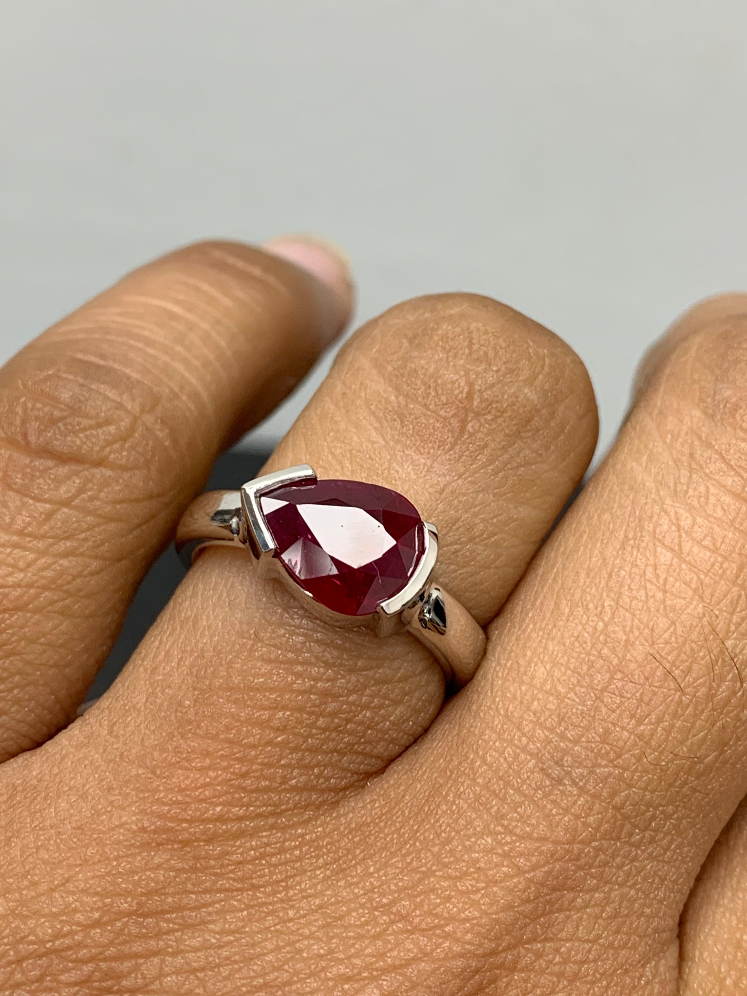 A stunning well-crafted engagement ring showcasing a 1.85-carat pear shape Ruby. Set in a polished 14K White Gold mounting. Handcrafted in our New York City workshop. 

Style is available in different price ranges. Prices are based on your