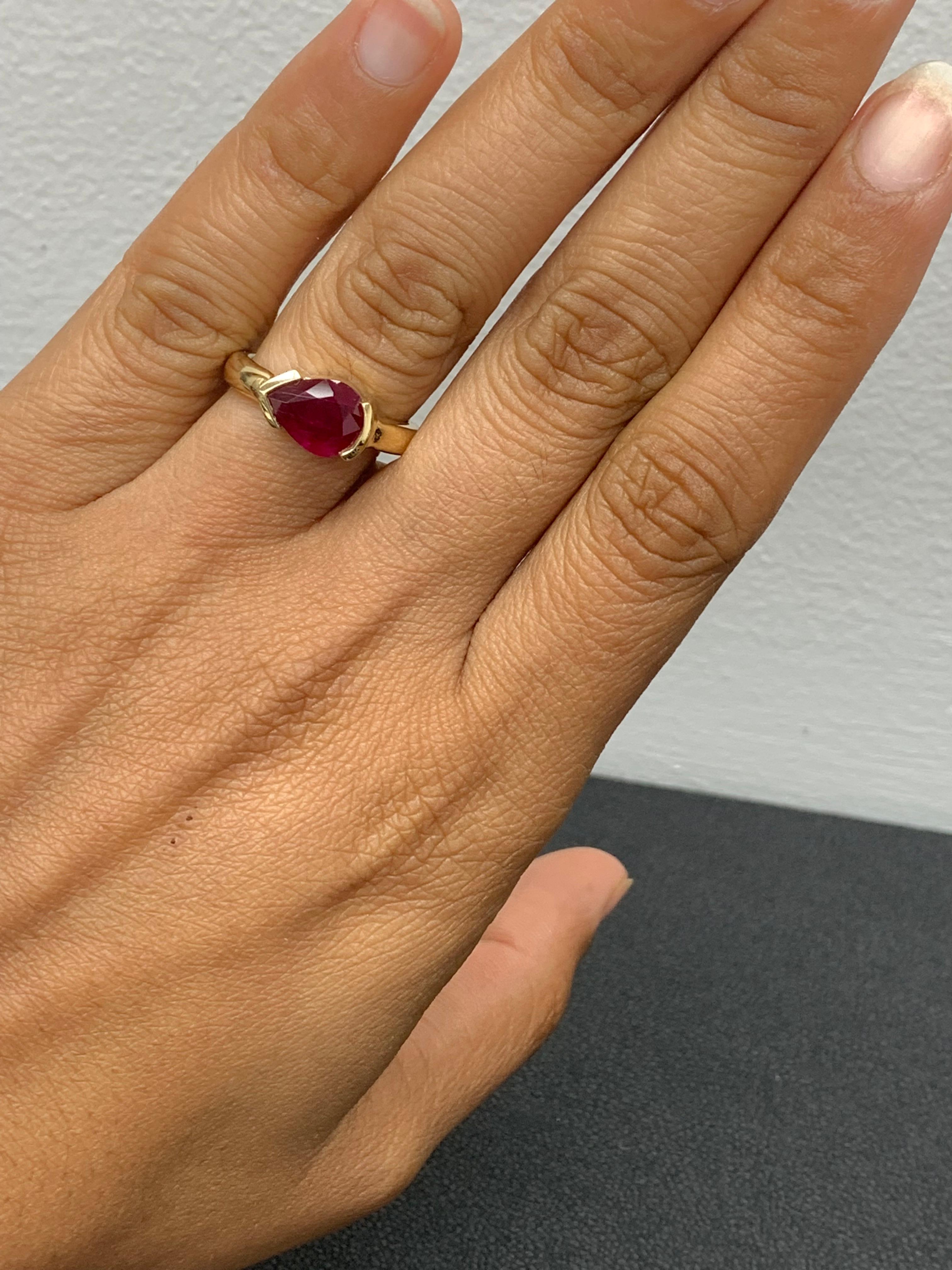 A stunning well-crafted engagement ring showcasing a 1.85-carat pear shape Ruby. Set in a polished 14K Yellow Gold mounting. Handcrafted in our New York City workshop. 

Style is available in different price ranges. Prices are based on your