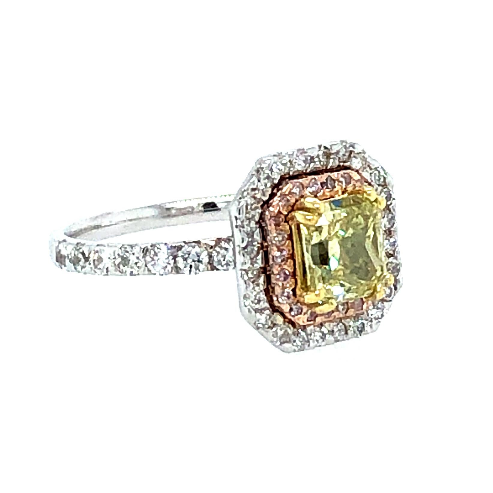 Offered here is a gorgeous GIA certified natural fancy intense yellow radiant cut diamond with natural 
pink and white diamonds set in 18kt white, yellow and rose gold. 
Center diamond GIA report# 2205176067, 1.11 carat fancy intense yellow radiant