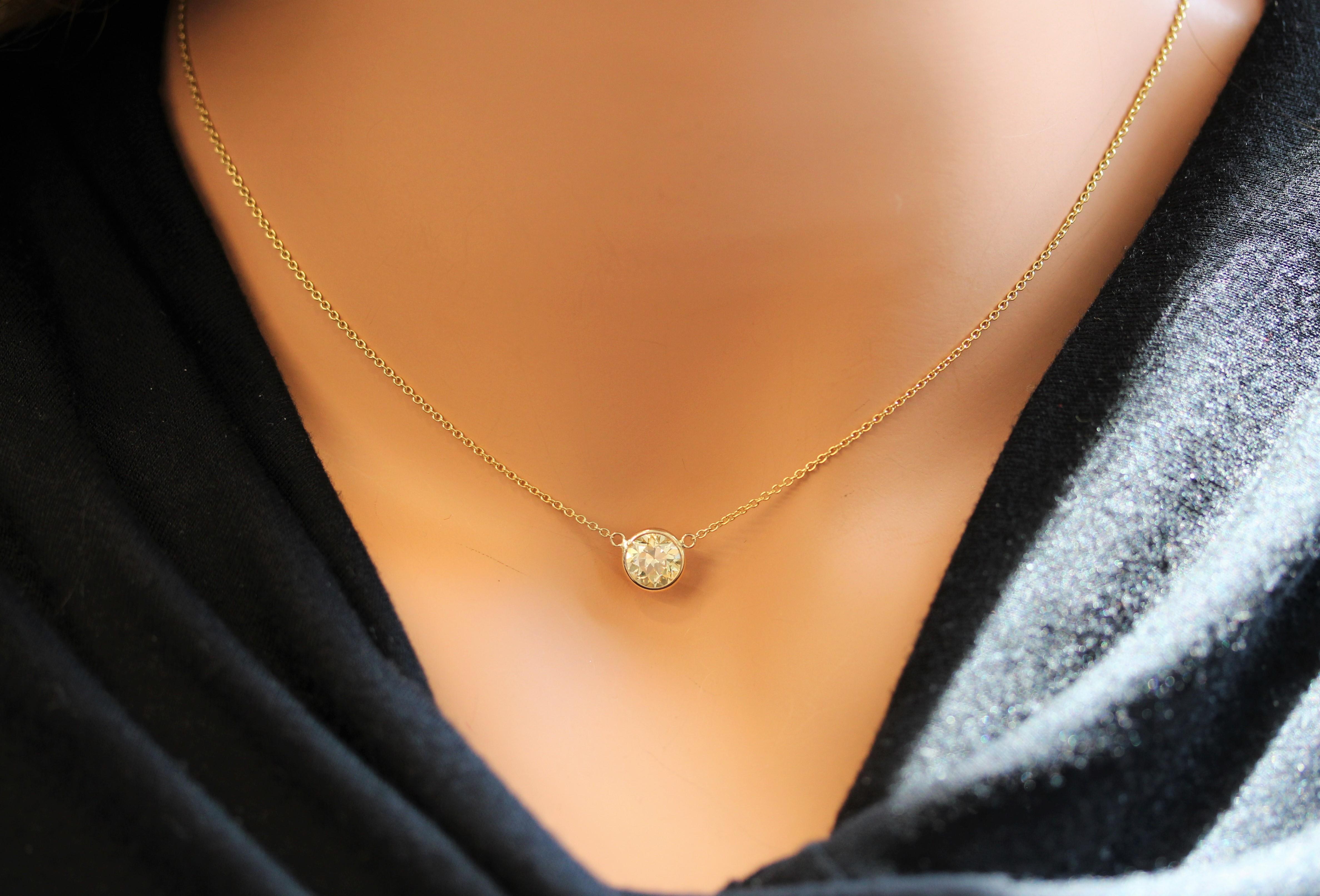 Make a statement worn solo and level up your collar candy when layered. How would you wear it? This is a natural Round and clarity SI1, handmade necklace wire-wrapped in 14k yellow gold. This is a piece you'll wear forever. We made them 18 inches