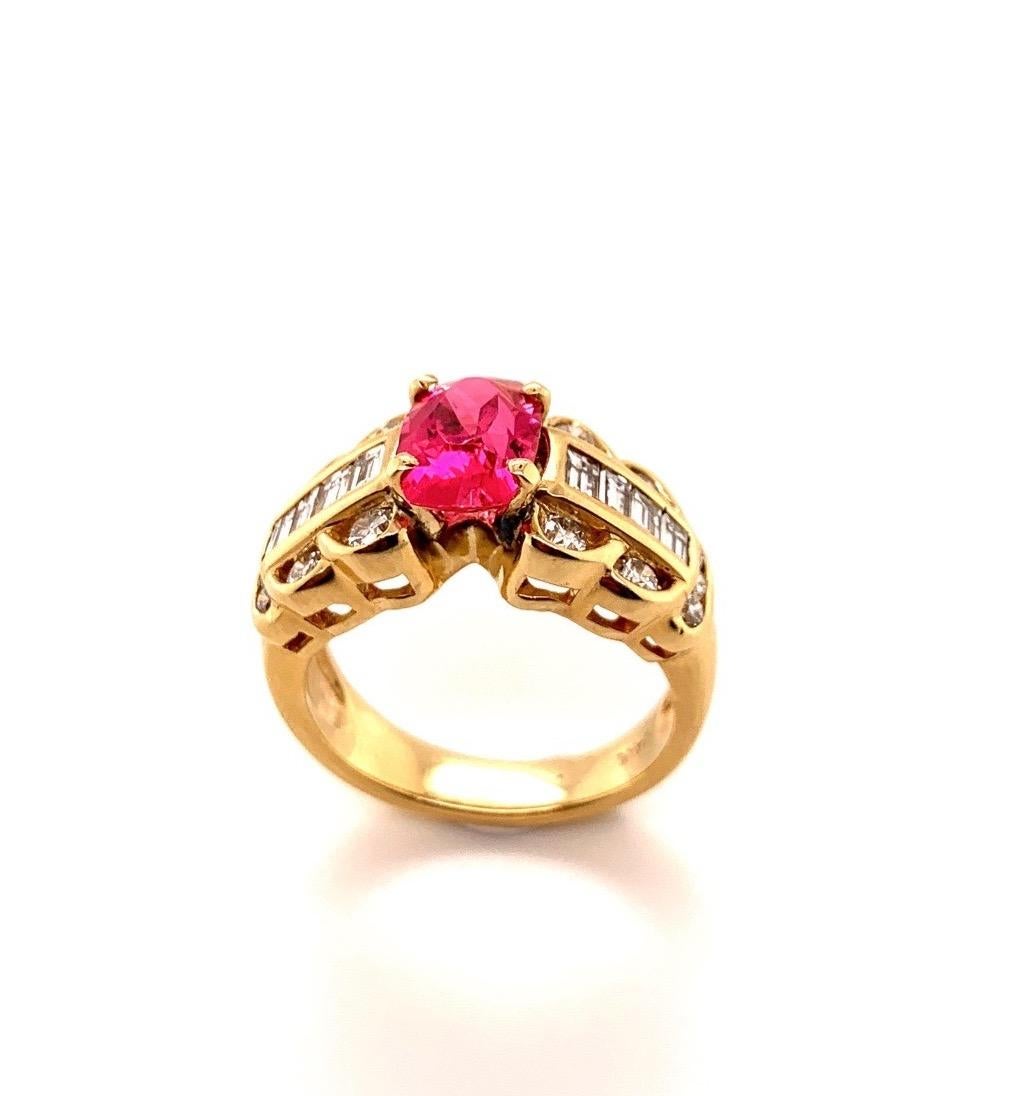 Rubies and red spinels are mostly set  in white gold. Elke likes to set them in yellow gold, it seems like the reddish pink stones look softer in the yellow gold. You might agree or disagree. 
The rough for this 1.85 carat reddish pink Spinel came