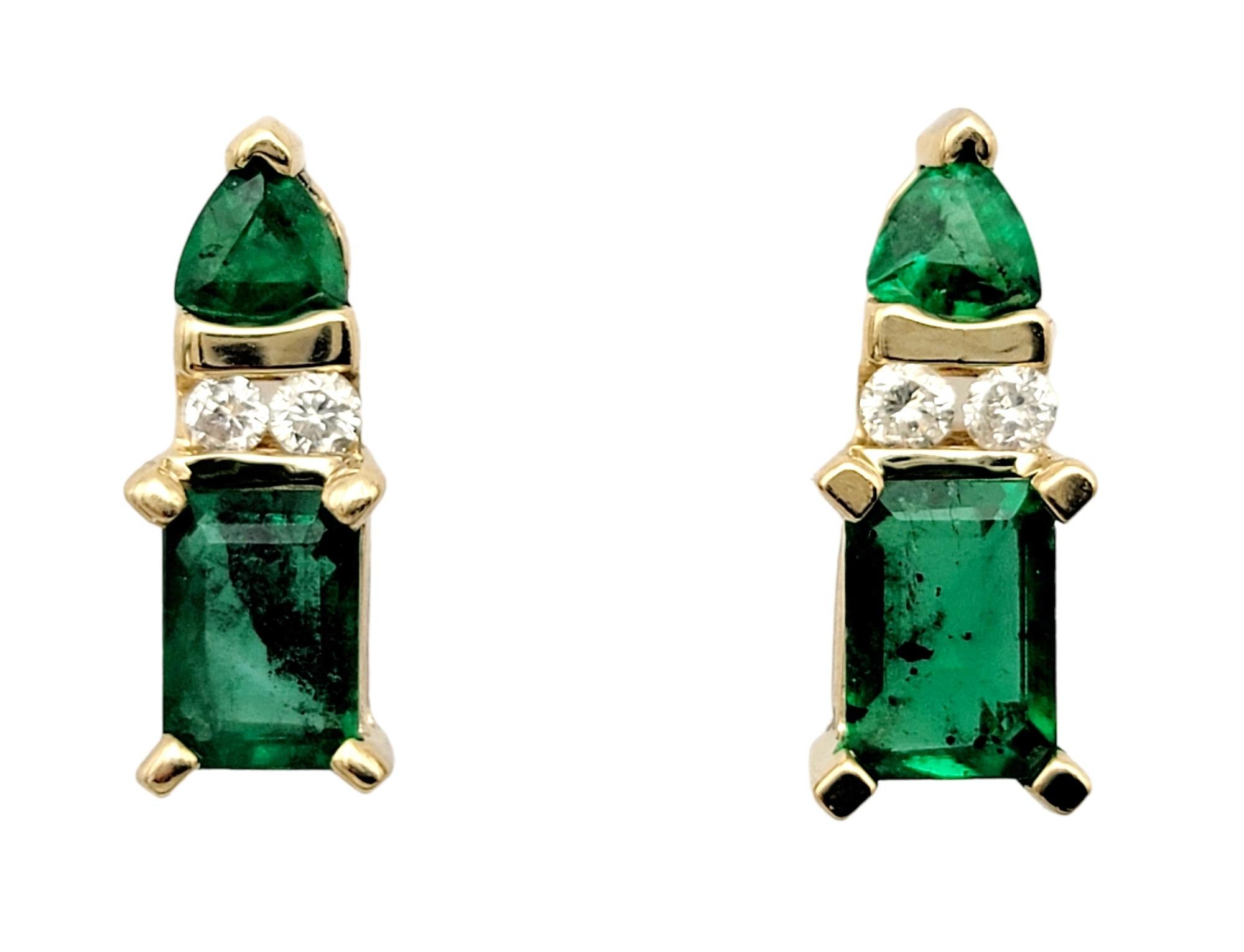 Pretty emerald and diamond studs in an elongated vertical layout. The bright green stones paired with the icy white diamonds give just the right pop of color for everyday wear.

Earring type: Stud
Metal: 14K Yellow Gold
Natural Emerald: 1.72 carat