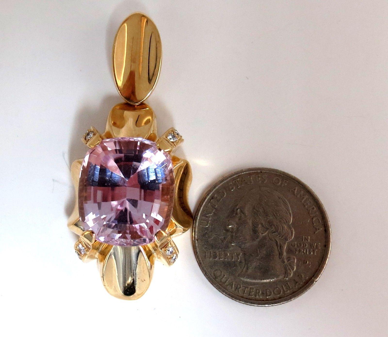 Kunzite,  drop Pendant.

Vintage Prime

18.00ct. natural cushion cut kunzite

mm / rose pink

clean clarity and transparent. 

.50ct. Natural diamonds.

G color Vs-2 clarity

14Kt yellow gold 

24 grams.

pendant height:  2 inch

width: 1