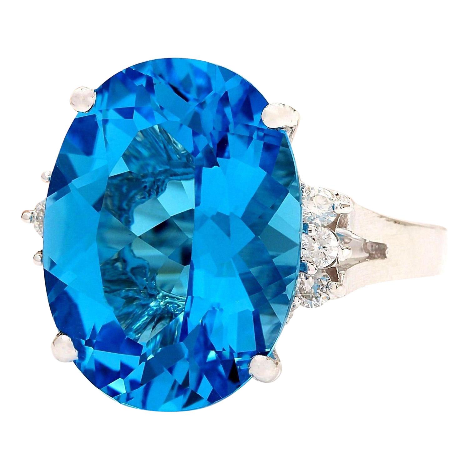 18.50 Carat Natural Topaz 14K Solid White Gold Diamond Ring
 Item Type: Ring
 Item Style: Cocktail
 Material: 14K White Gold
 Mainstone: Topaz
 Stone Color: Blue
 Stone Weight: 18.20 Carat
 Stone Shape: Oval
 Stone Quantity: 1
 Stone Dimensions: