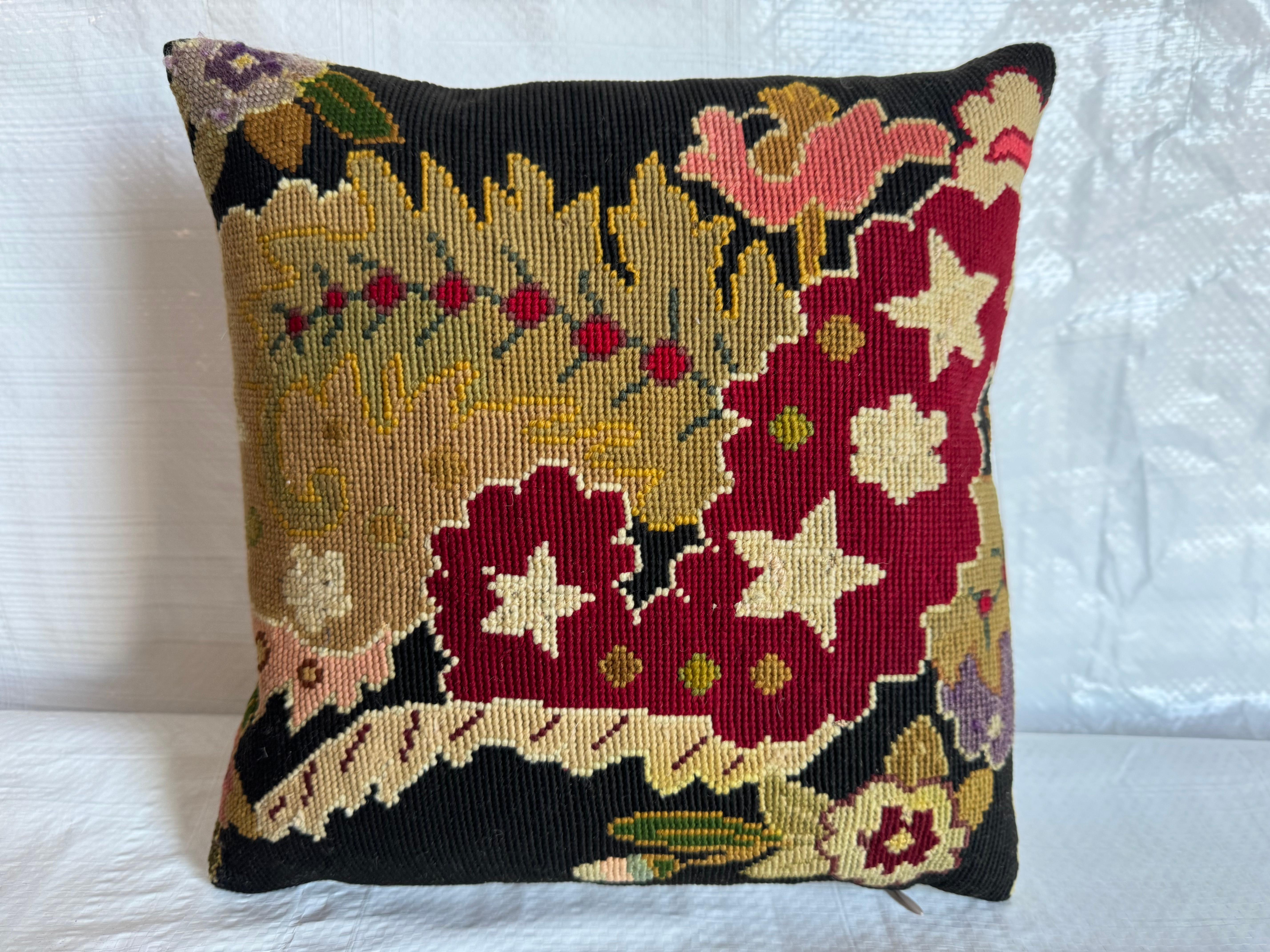 Indulge in elegance with the English Needlework Pillow, sized at 12 x 12. This finely crafted accent piece exudes timeless charm and intricate detailing for a touch of sophistication.