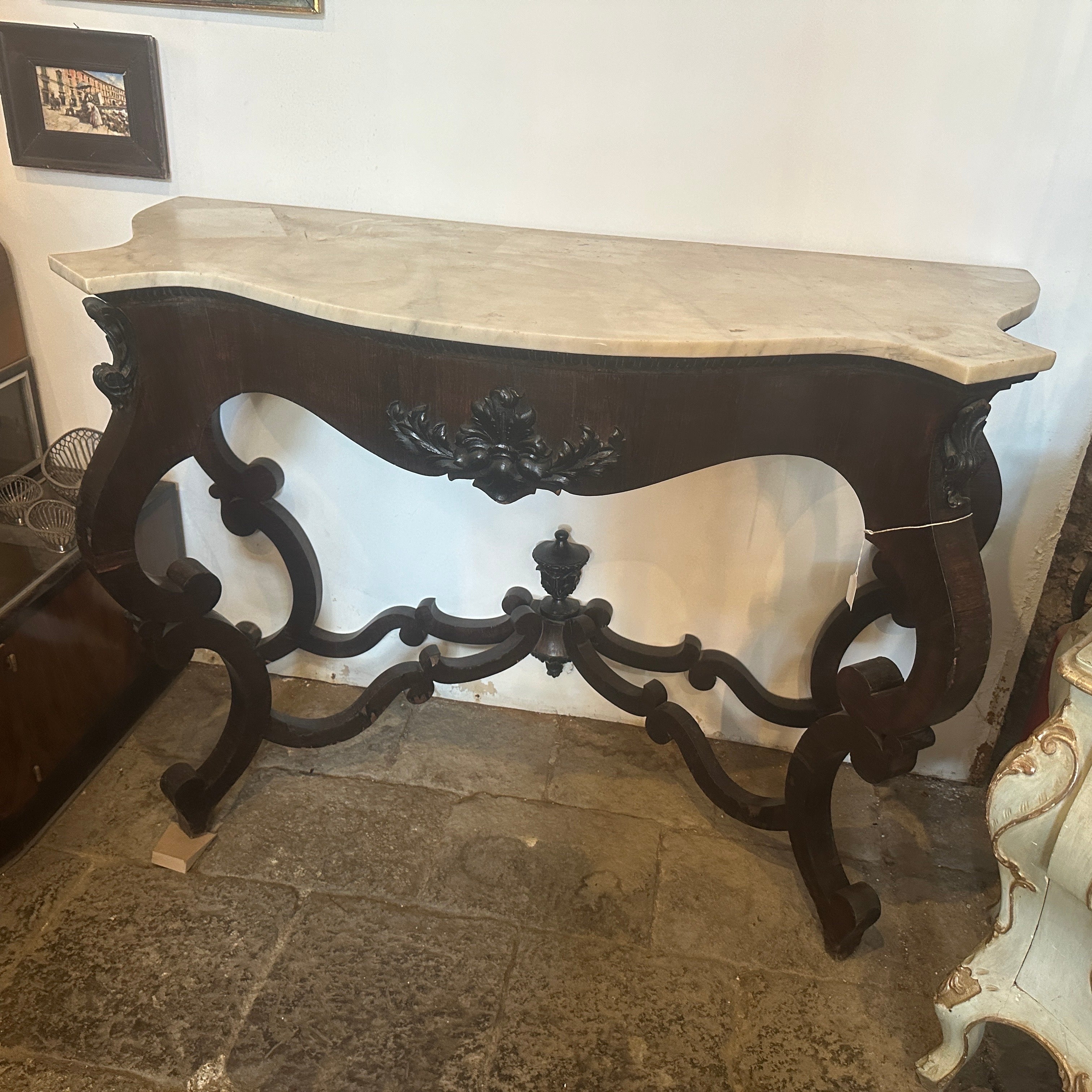 A Louis Philippe consolle hand-crafted in Sicily in the mid 19th century, it's in lovely original conditions with normal signs considering age. Console is a piece of furniture that reflects the design and style of the Louis Philippe period, which