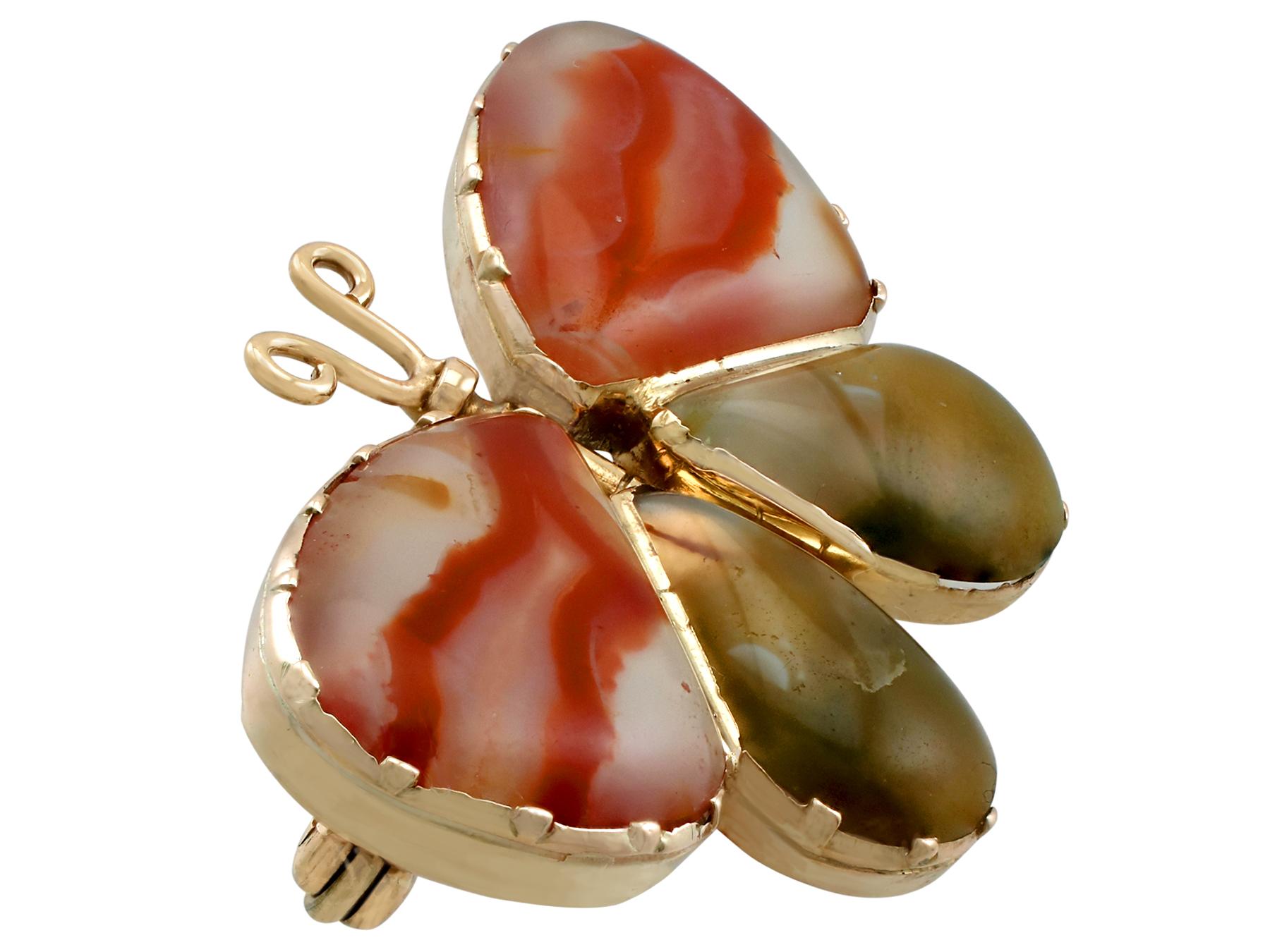 An impressive antique Victorian agate and 9 karat yellow gold 'butterfly' brooch; part of our diverse antique jewelry and estate jewelry collections.

This fine and impressive antique brooch has been crafted in 9k yellow gold.

The brooch has been