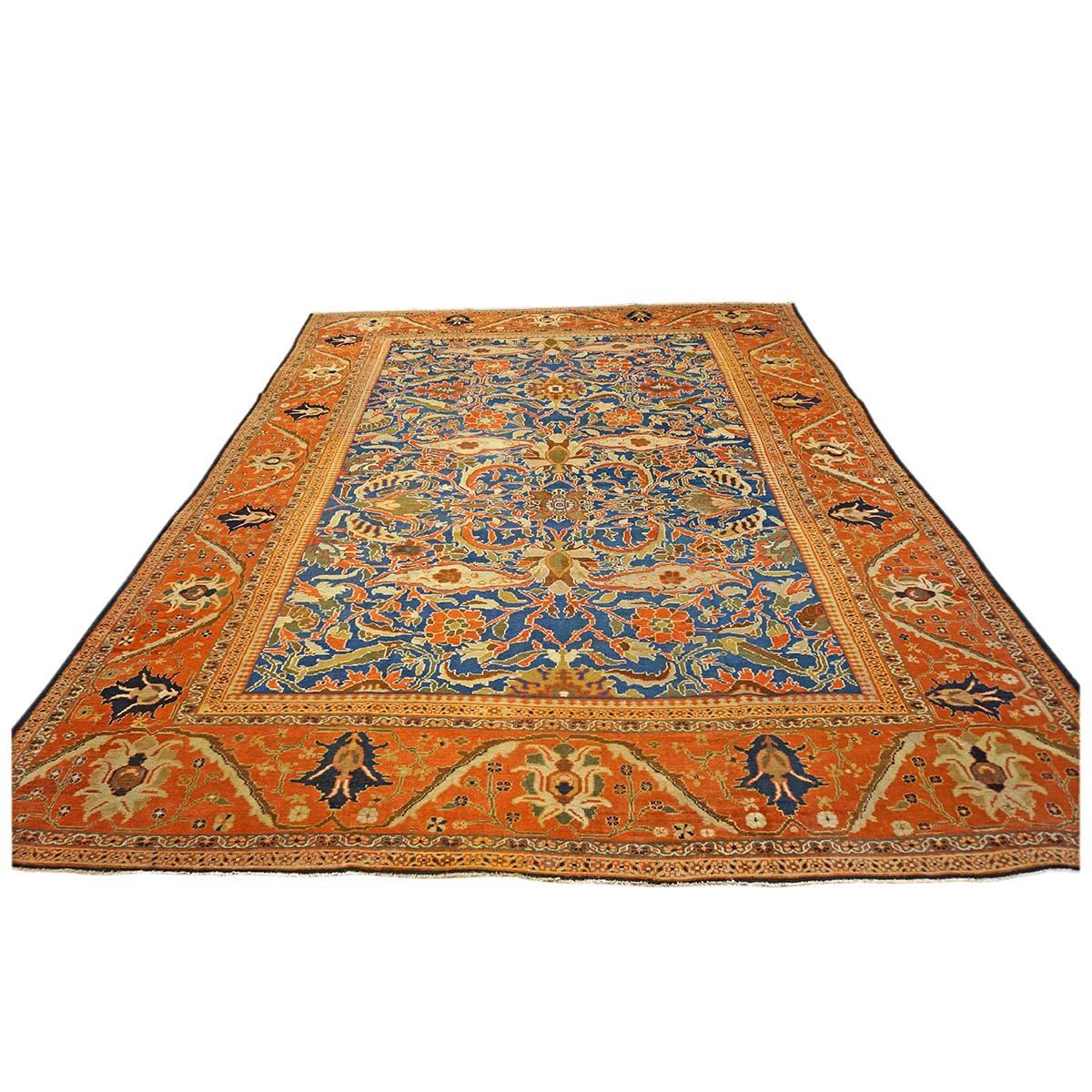 We present a beautiful Antique Persian Ziegler Sultanabad 12x15 Orange, Blue, & Ivory Handmade Area Rug #9902456. Ziegler Sultanabad carpets are classics in the world of interior design, and they continue to be used in many new and exciting ways in