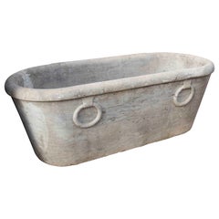 1850s Antique Stone-carved Bathtub with Sculpted Handles in a Classical Style.