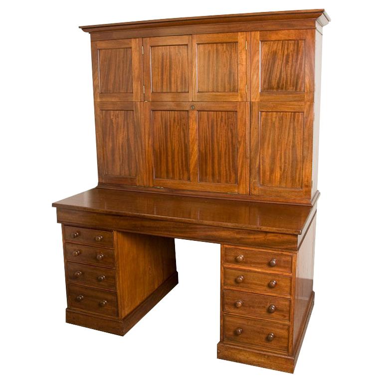 English mahogany estate desk with molded cornice upper cupboard, ca. 1850