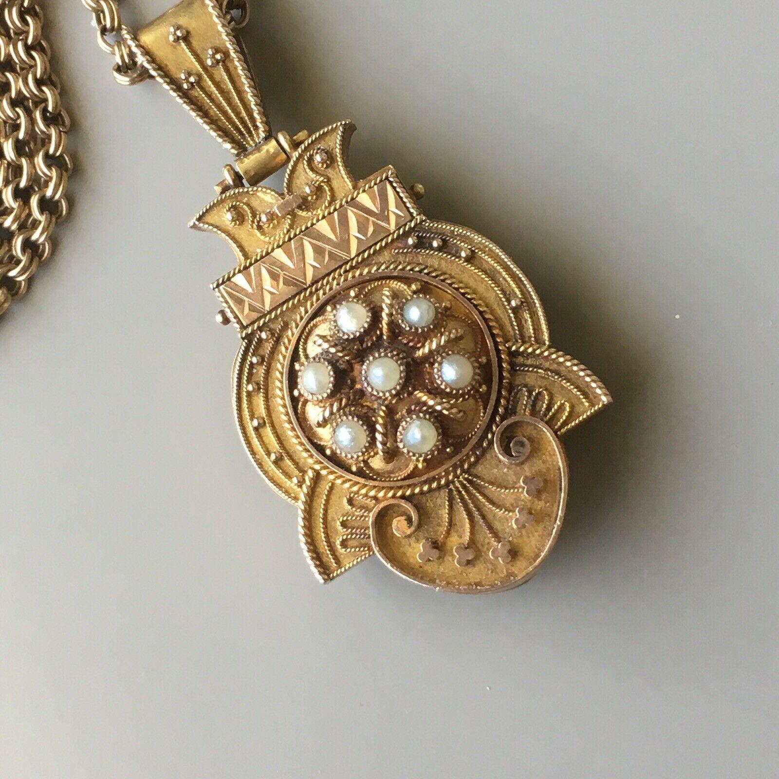 Rare Sample of Antique Etruscan revival circa 1850s Locket Pendent( 1 inch wide and 2 inch long), 25 inch original Victorian hand made chain, all tested close to 14k Yellow Gold & Rose Gold enhanced by Seed Pearls, Back Locket. Detailed Filigree