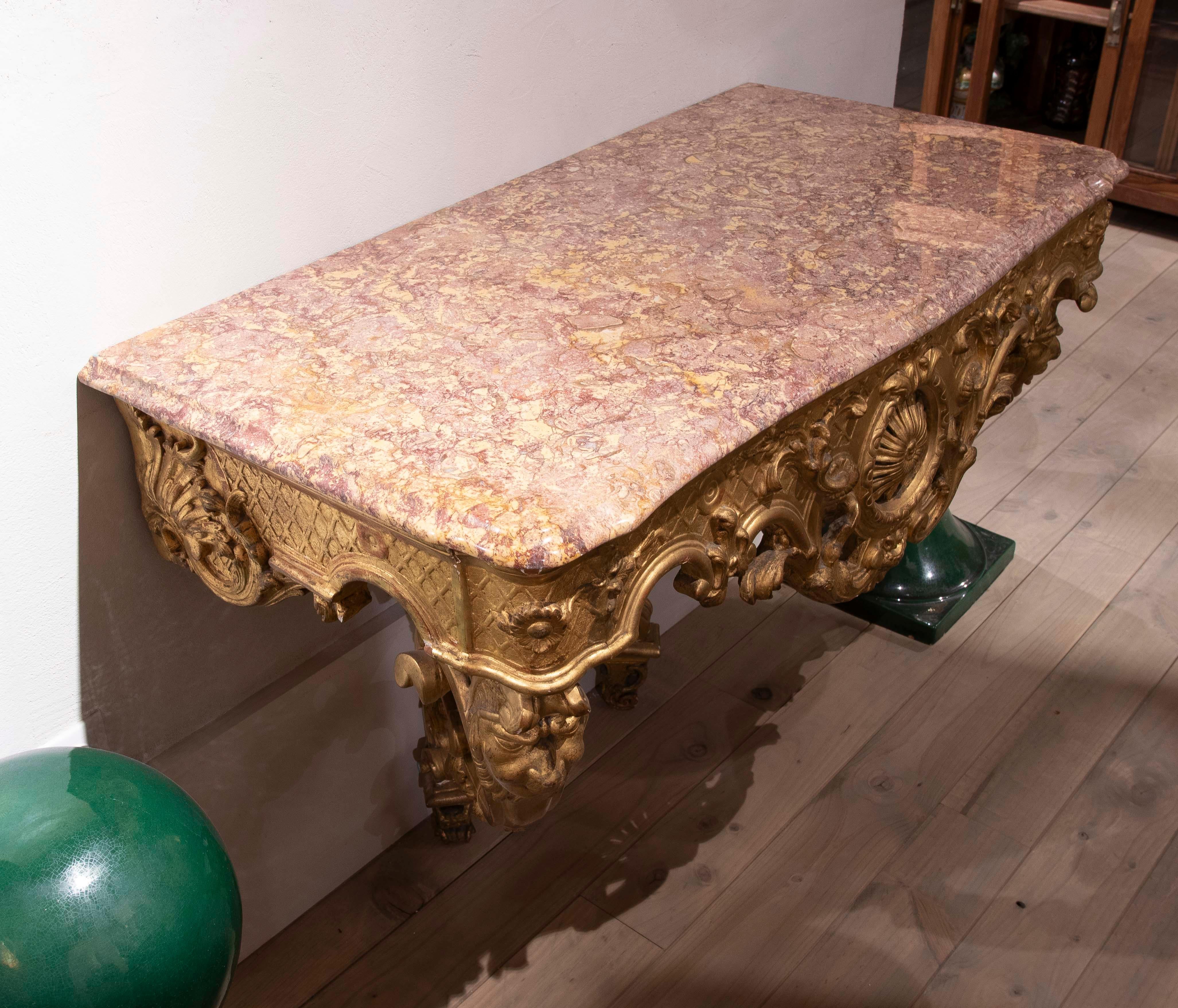 French 1850s Gold Baroque Console with Pink Marble Top For Sale