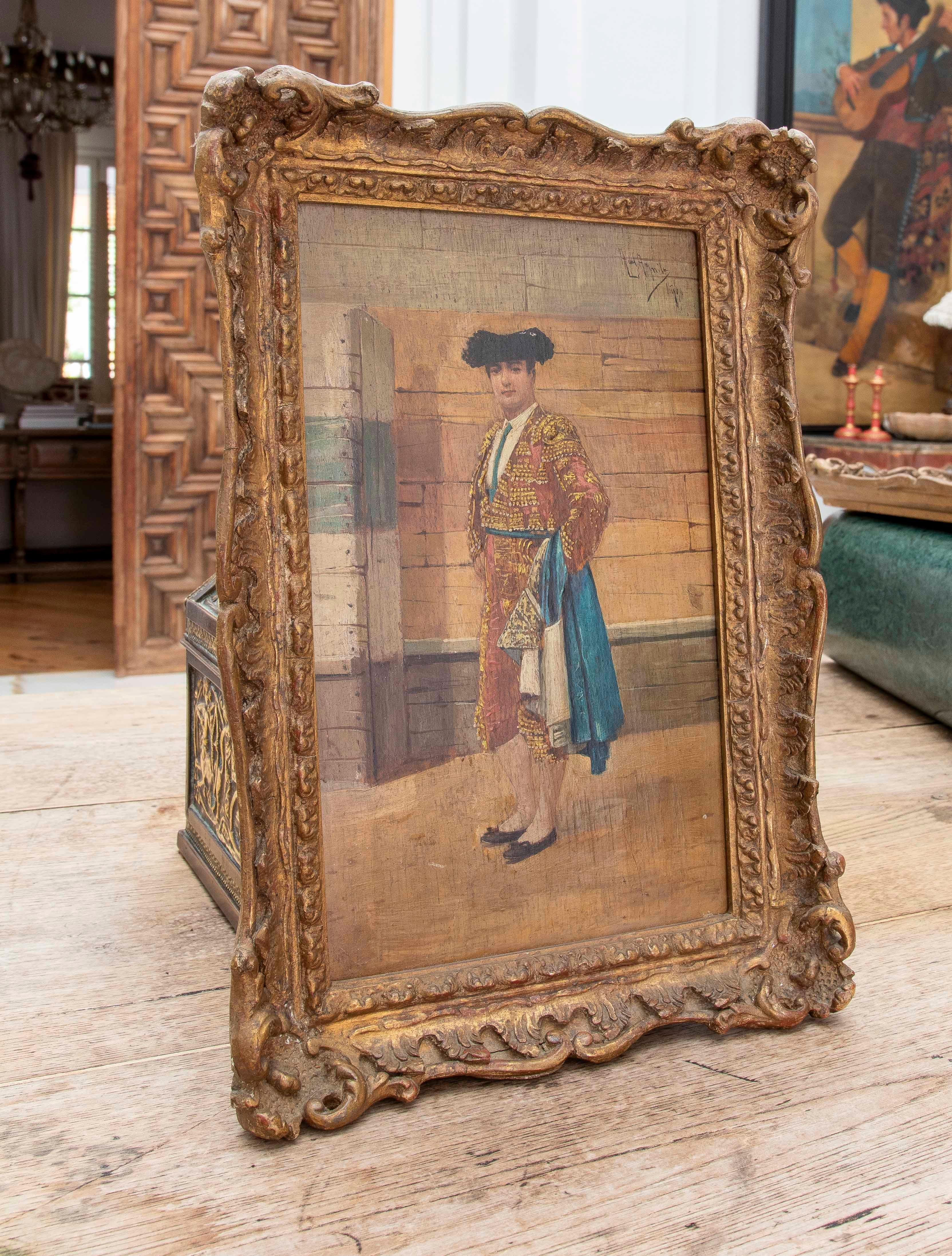 Spanish 1850s Pair of Framed Andalusian Wood Paintings of a Bullfighter and a Woman For Sale