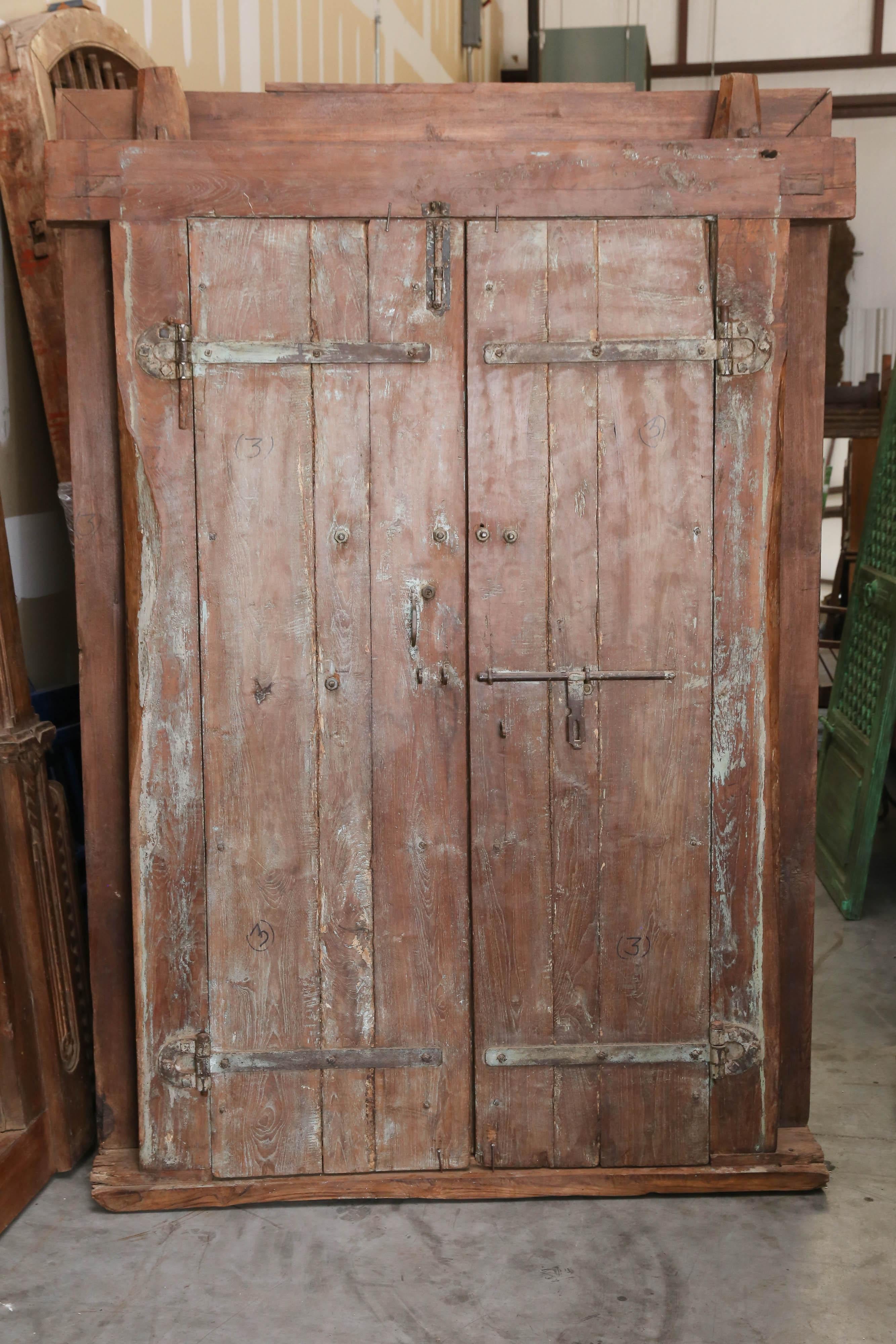 Anglo Raj 1850s Solid Teak Wood Highly Carved Entry Door from a Settler's Home in Goa For Sale