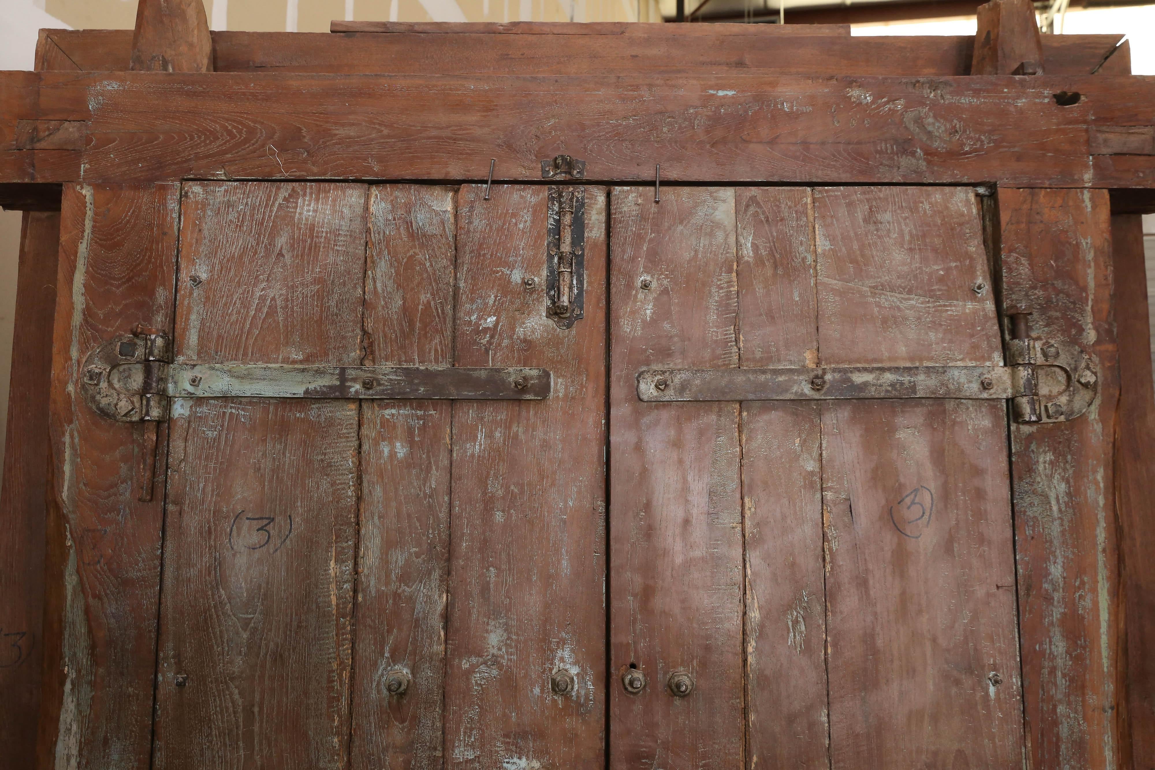 Hand-Crafted 1850s Solid Teak Wood Highly Carved Entry Door from a Settler's Home in Goa For Sale