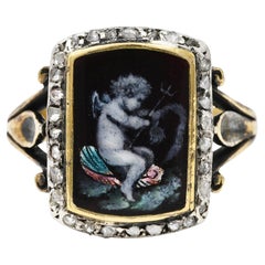 Bague Cupidon néoclassique victorienne des années 1850 en émail et diamants surmontée d'argent 18 carats