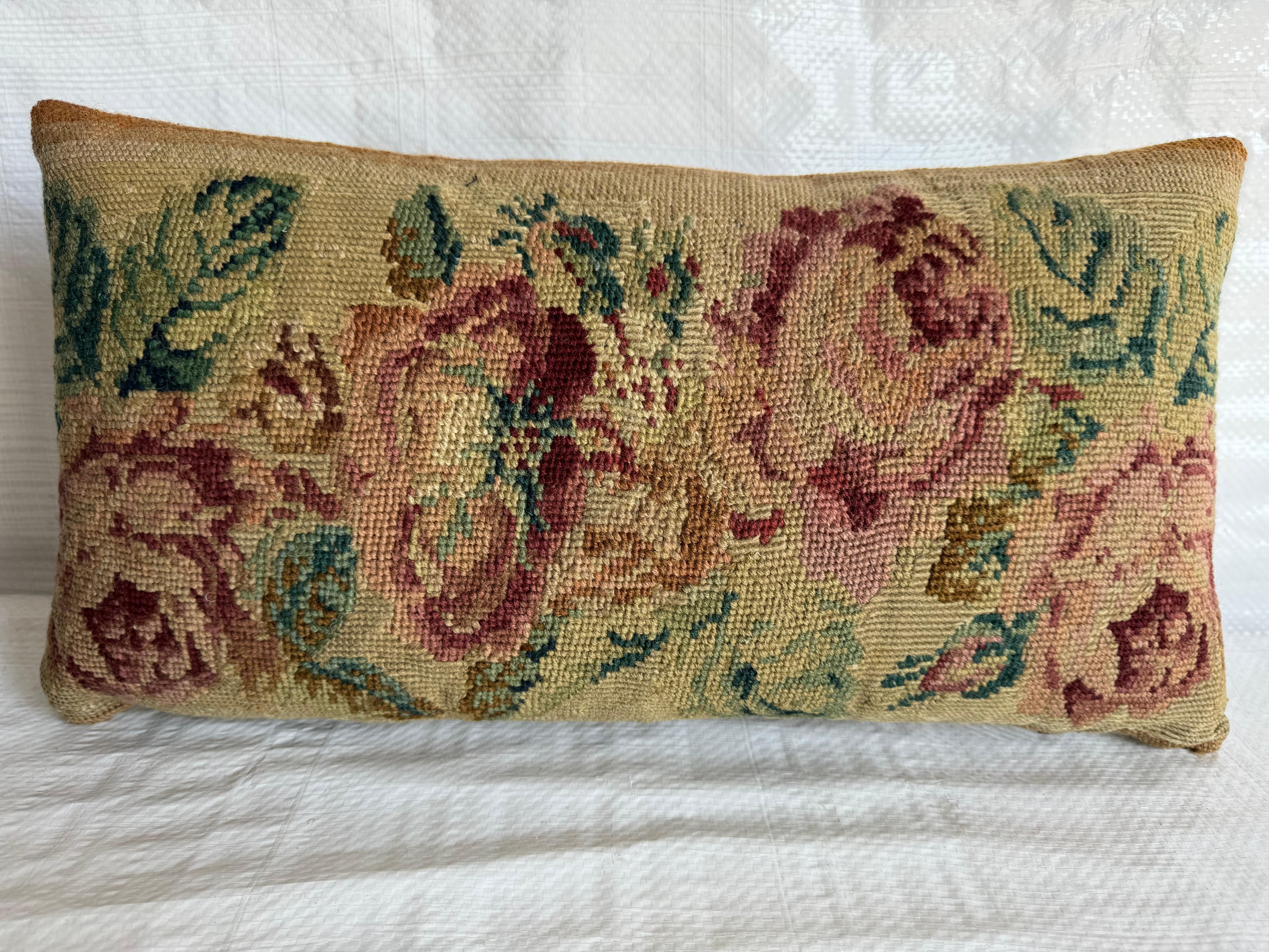 Uncover the refined beauty of yesteryear with our exquisite 1851 English Needlework Pillow, measuring 19