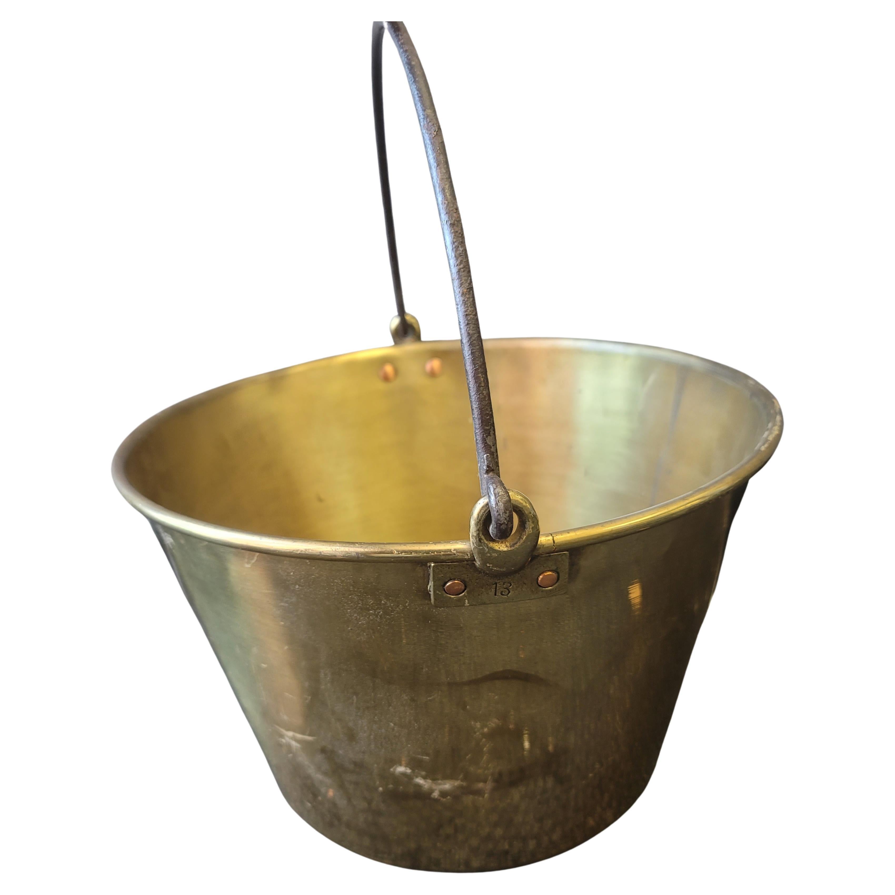 A 1851 Hayden Pat. Ansonia brass Co. Bail brass fireplace bucket or planter in good condition. Polished.
Measures 15