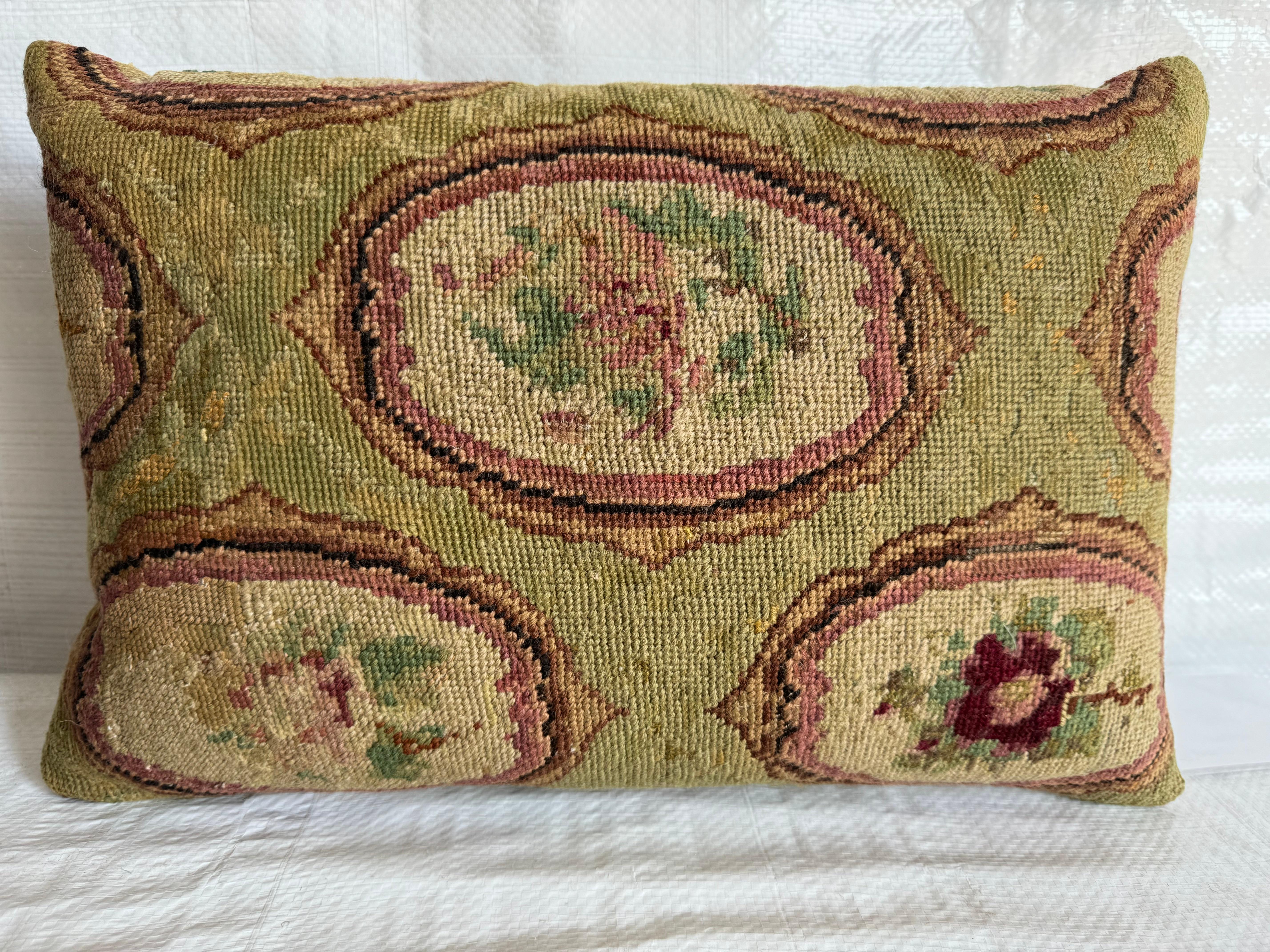 Embark on a journey through time with our exquisite 1852 English Needlework Pillow, measuring 17