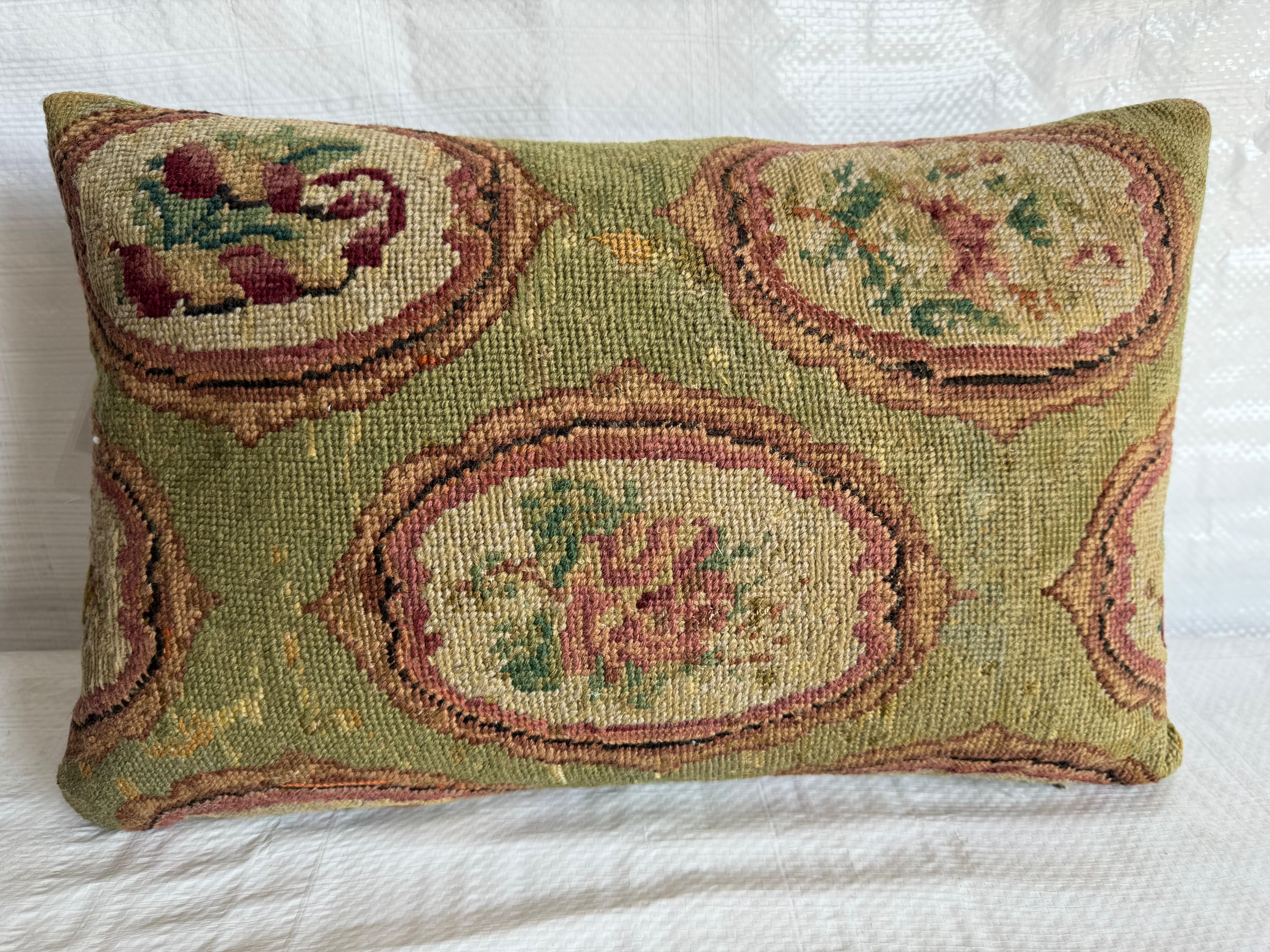Indulge in the refined charm of yesteryear with our Elegance Preserved: 1853 English Needlework Pillow, measuring 12