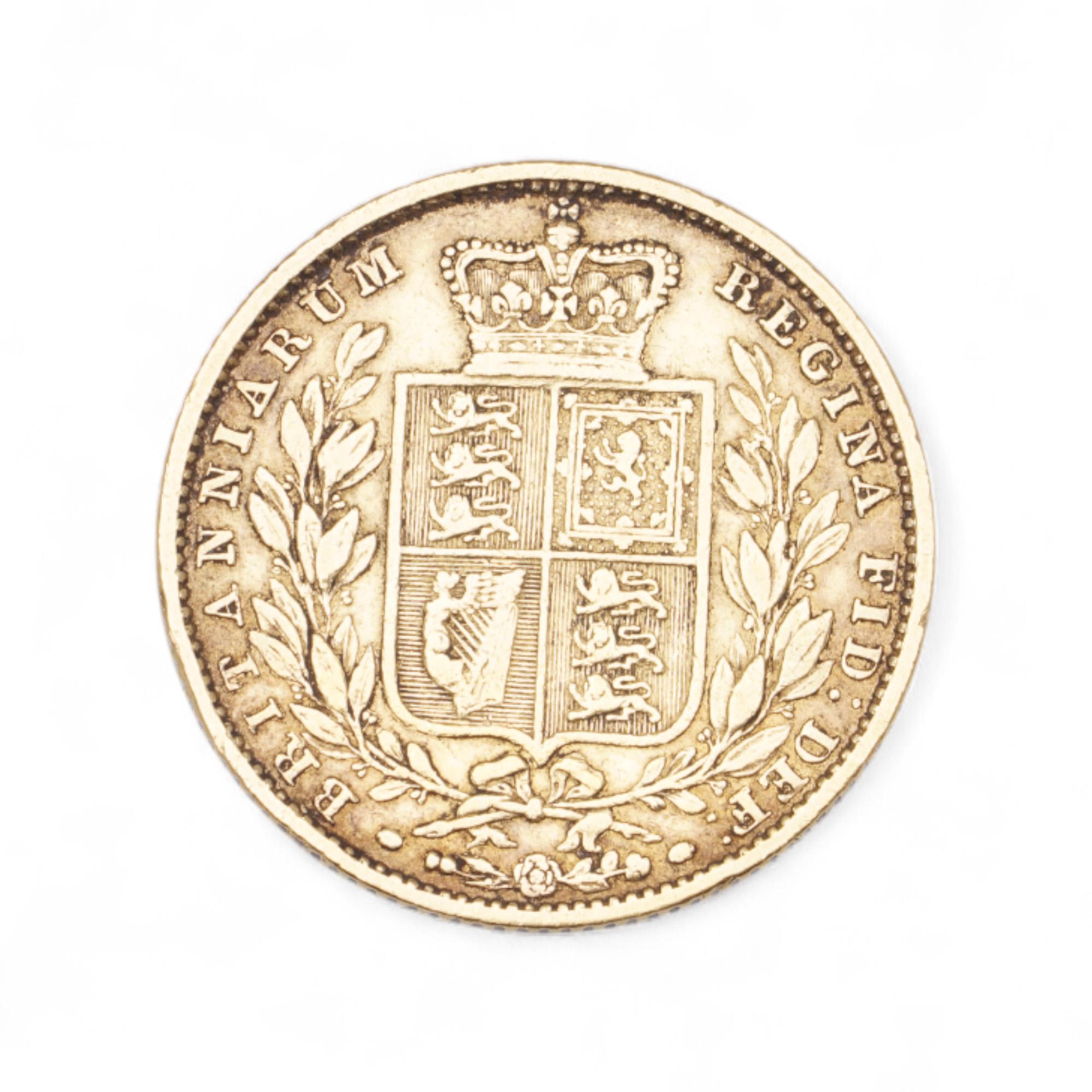An original 1853 Queen Victoria “Young Head” Shield Back gold sovereign, struck in 22 carat gold, presented with its Westminster case and Certificate of Authenticity. The obverse features William Wyon’s celebrated ‘Young Head’ portrait of Queen