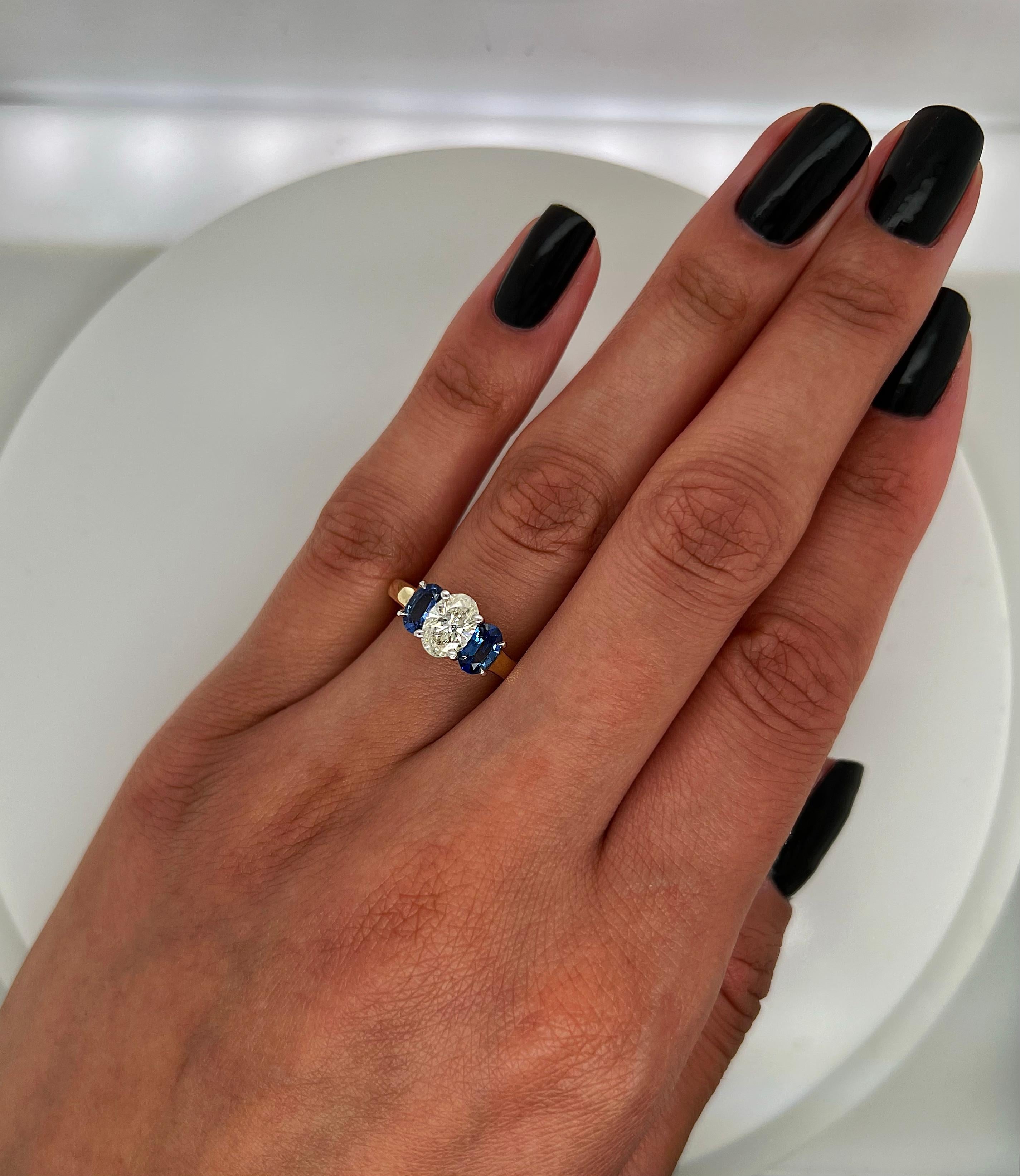 Oval Cut 1.85 Total Carat Sapphire and Diamond Ladies Ring For Sale
