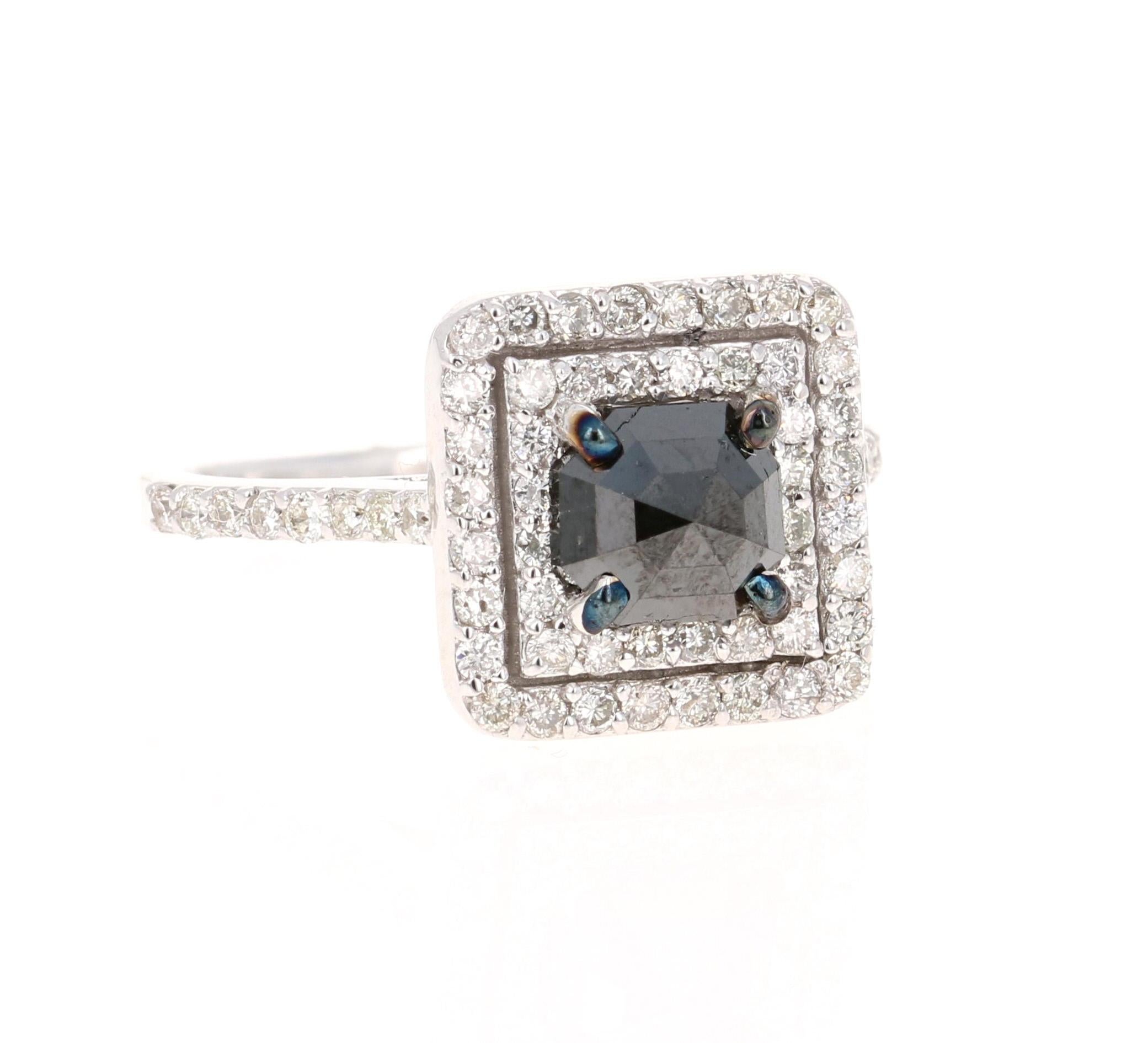 This Black and White Diamond Ring is a unique Engagement Ring or an every day ring

Beautiful Cushion Cut Black Diamond that weighs 1.07 Carats and is surrounded by 64 Round Cut Diamonds that weigh 0.79 Carats. The total carat weight of the ring is