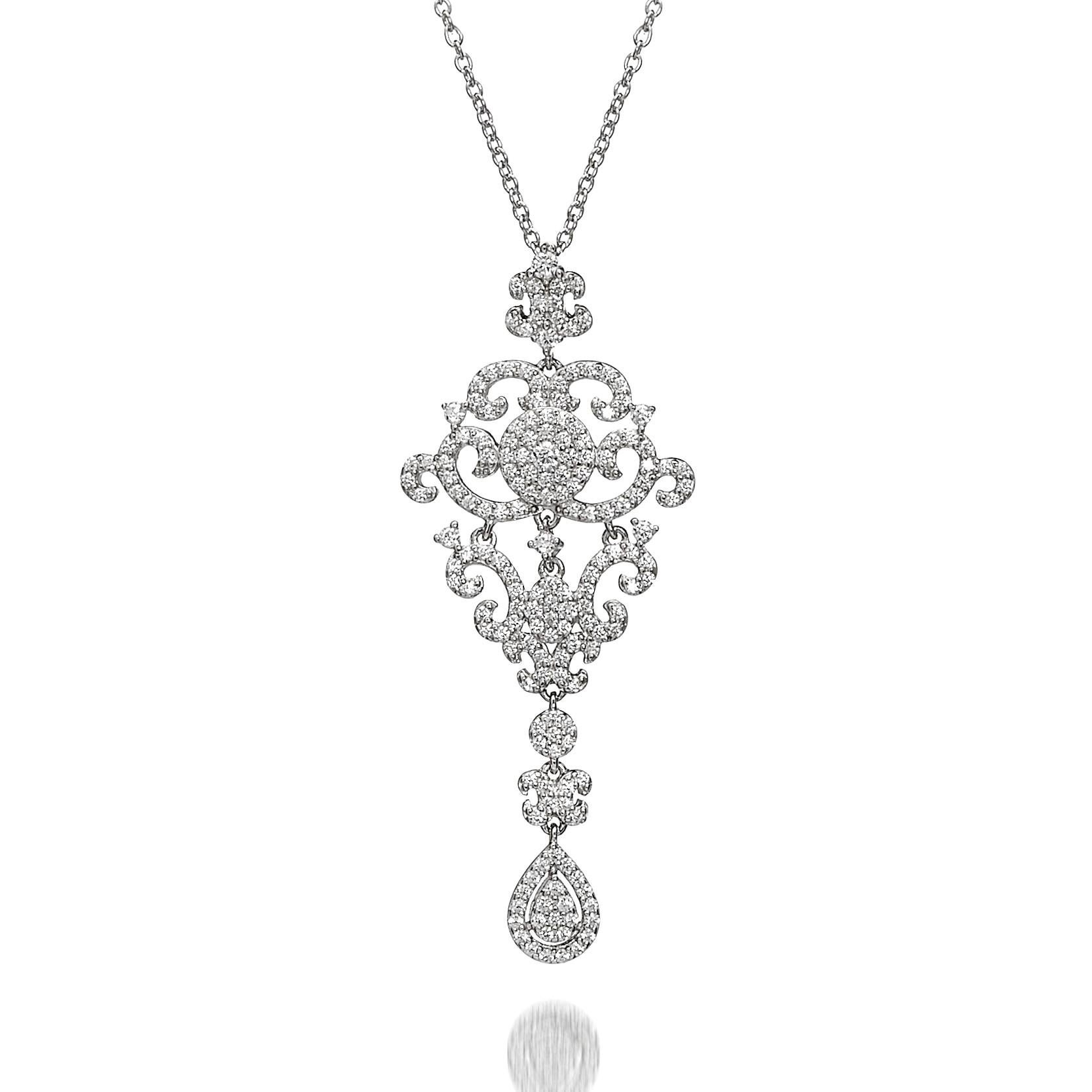 A truly exquisite, delicate lace filigree design pendant set with 1.86ct round brilliant cut cubic zirconia.

Composed of 925 sterling silver with white rhodium finish.

Chain measures 16ins with a 2ins extension.

Whether you're looking for a