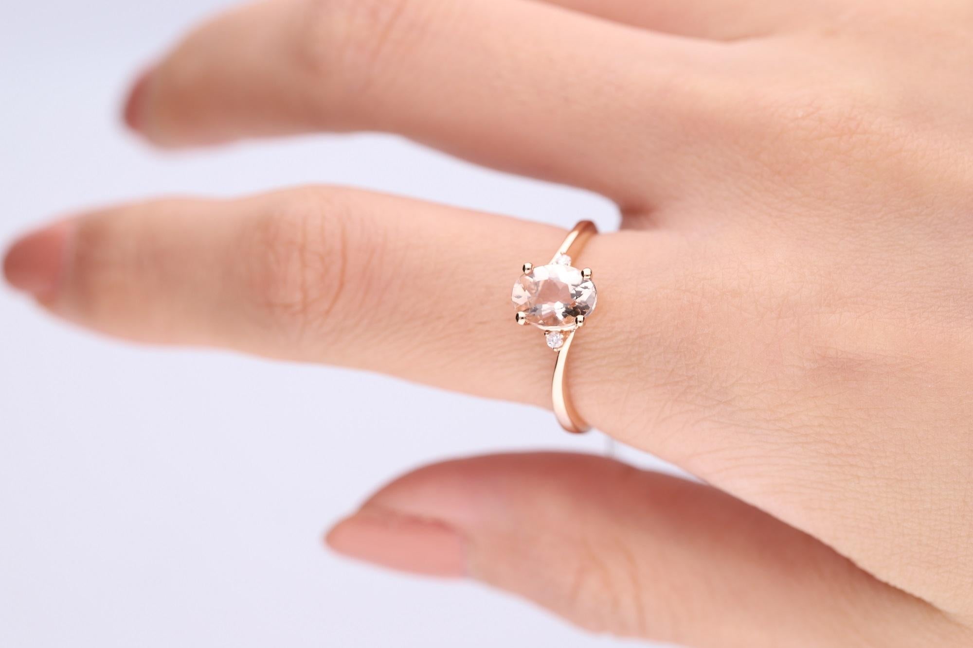 Stunning, timeless and classy eternity Unique Ring. Decorate yourself in luxury with this Gin & Grace Ring. The 14k Rose Gold jewelry boasts Oval-Cut Prong Setting Genuine Morganite (1 pcs) 1.04 Carat, along with Natural Round cut white Diamond (2