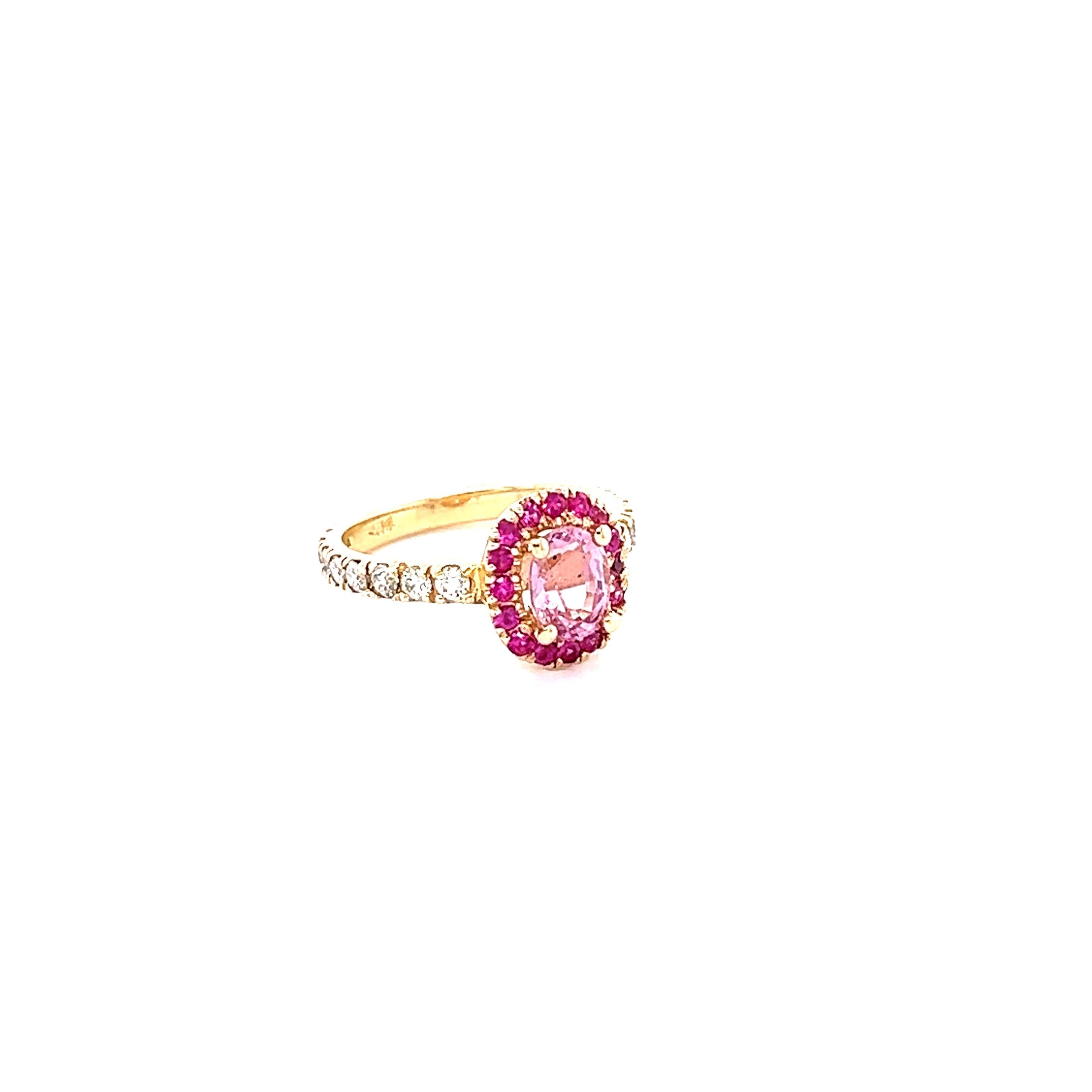 This beautiful ring has a Oval Cut Pink Sapphire that weighs 1.02 Carat. The Pink Sapphire has a beautiful light pink color that is saturated. The measurements of the sapphire are approximately 6.5 mm x 5 mm. 
The ring is further embellished with