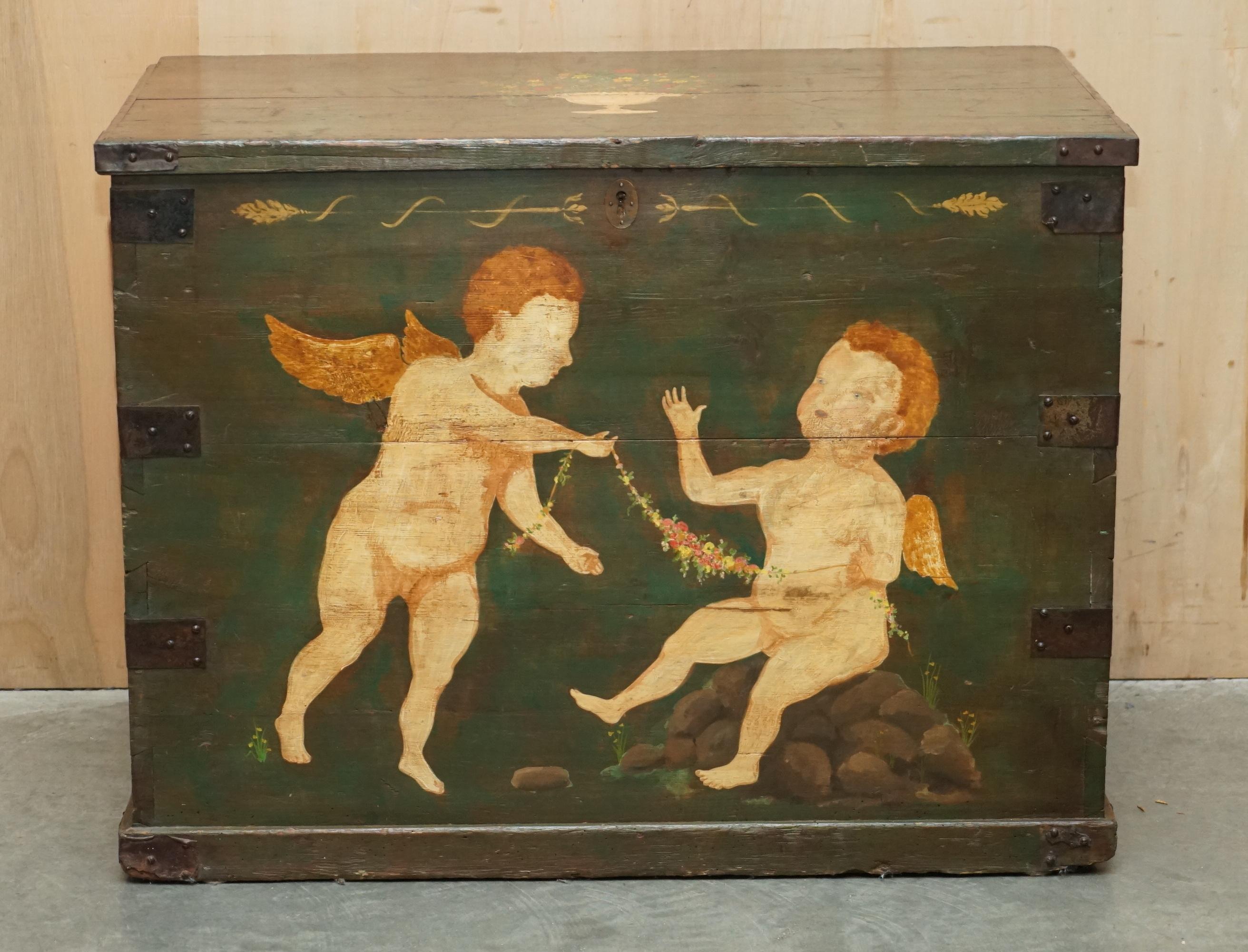 Royal House Antiques

Royal House Antiques is delighted to offer for sale this lovely original circa 1860's Italian hand painted storage trunk or chest depicting Cherubs 

Please note the delivery fee listed is just a guide, it covers within the M25