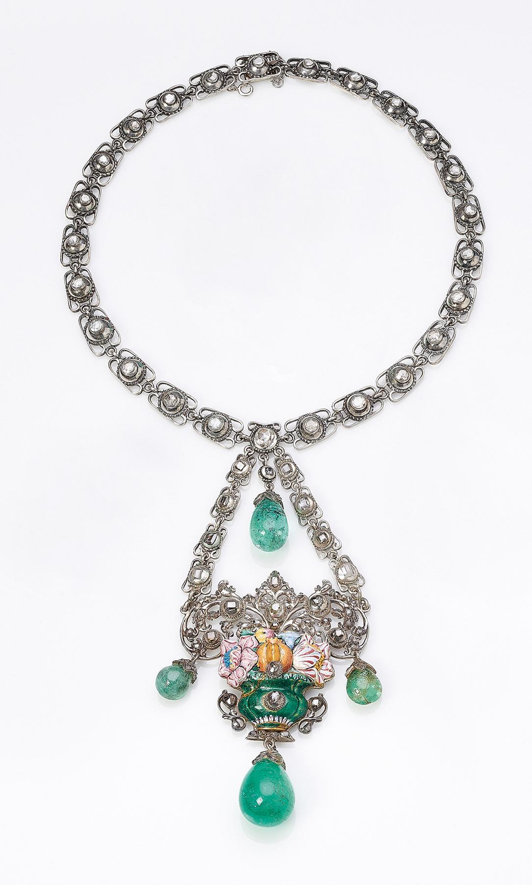Important 1860s Spanish Elizabethan Renaissance Necklace, Earrings and Ring Jewelry Set
Mounted in silver with tear cabouchon colombian emeralds and diamonds
Long earrings and ring with vegetable branches with rose cut diamonds and emeralds 
Emerald